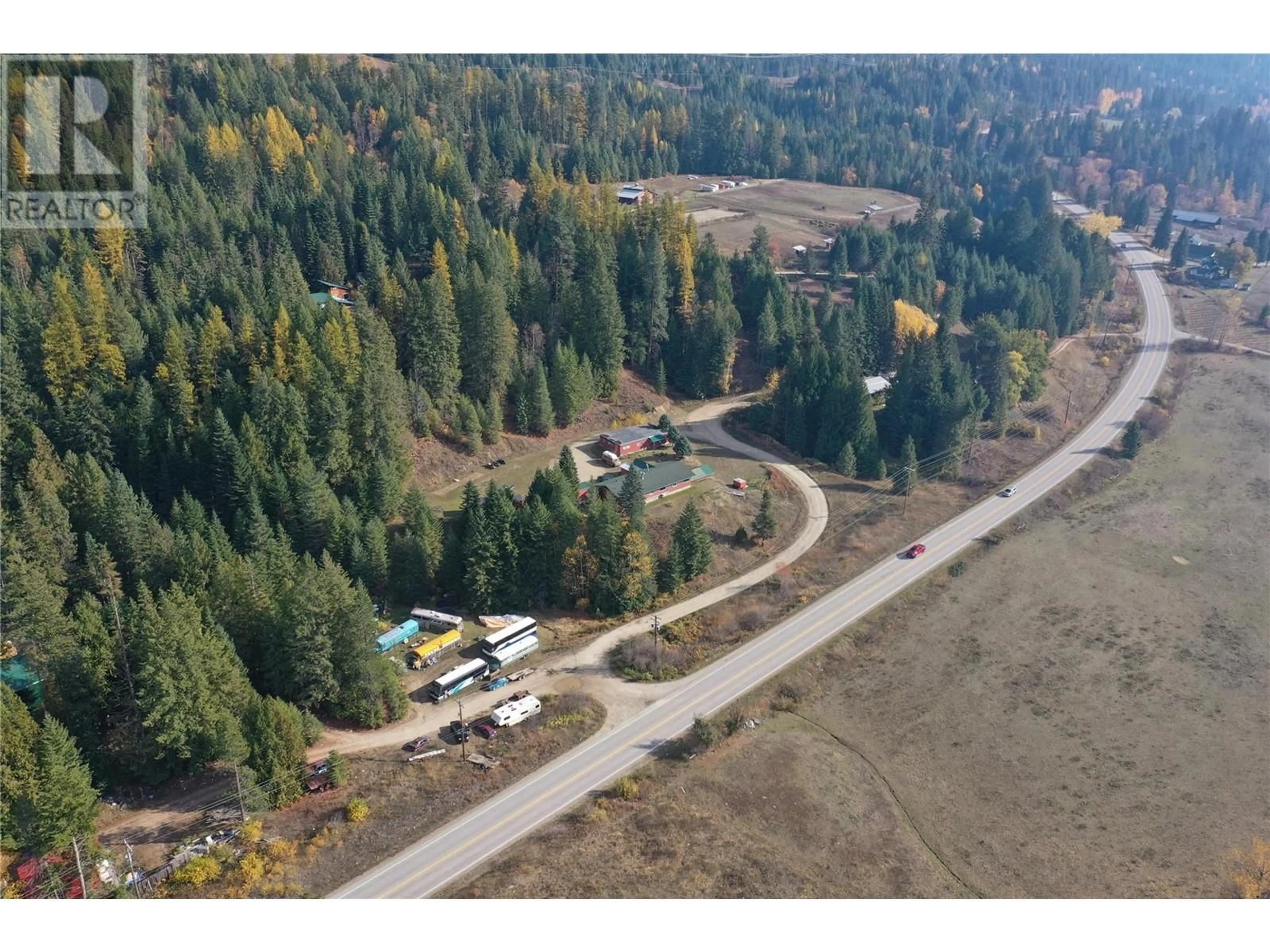A pic from outside/outdoor area/front of a property/back of a property/a pic from drone, forest/trees view for 2276 6 HIGHWAY, Crescent Valley British Columbia V0G1H0