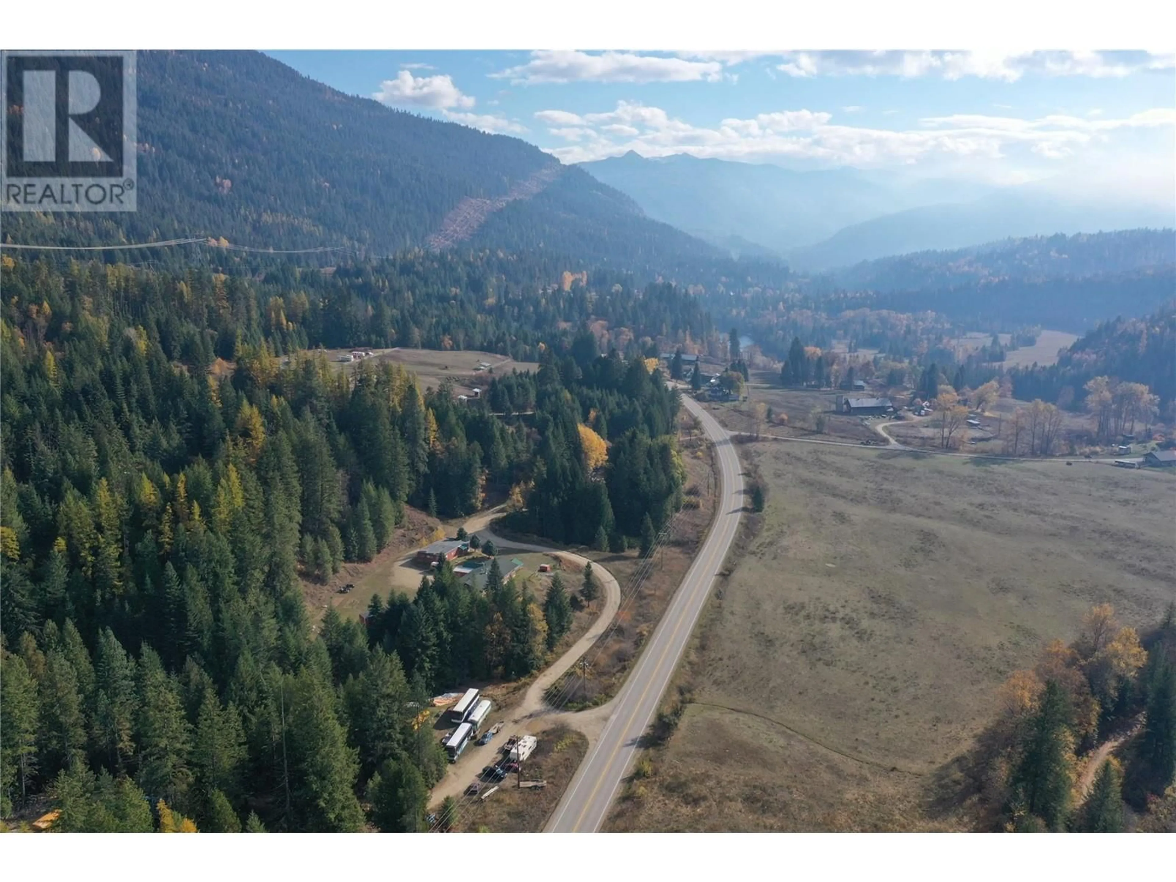 A pic from outside/outdoor area/front of a property/back of a property/a pic from drone, mountain view for 2276 6 HIGHWAY, Crescent Valley British Columbia V0G1H0