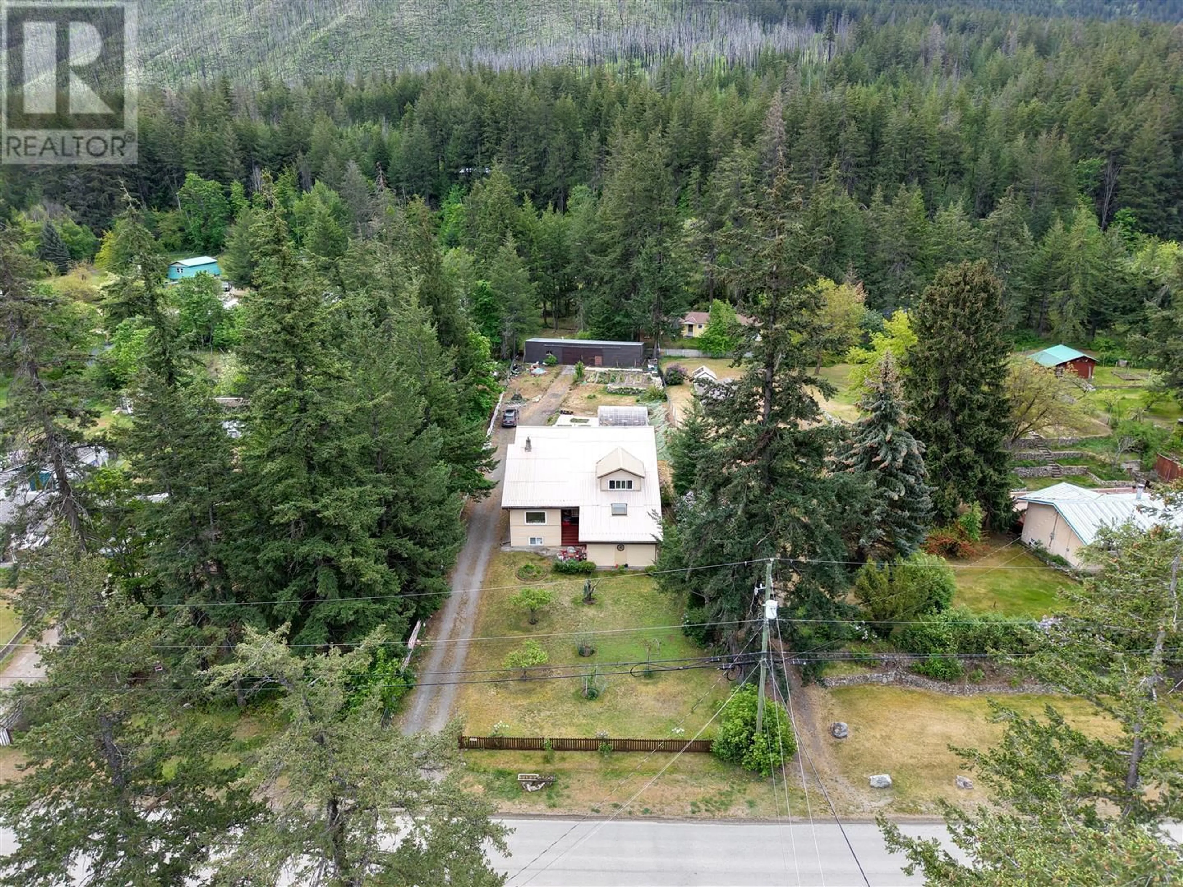 A pic from outside/outdoor area/front of a property/back of a property/a pic from drone, forest/trees view for 6890 SETON PORTAGE ROAD, Lillooet British Columbia V0N3B0