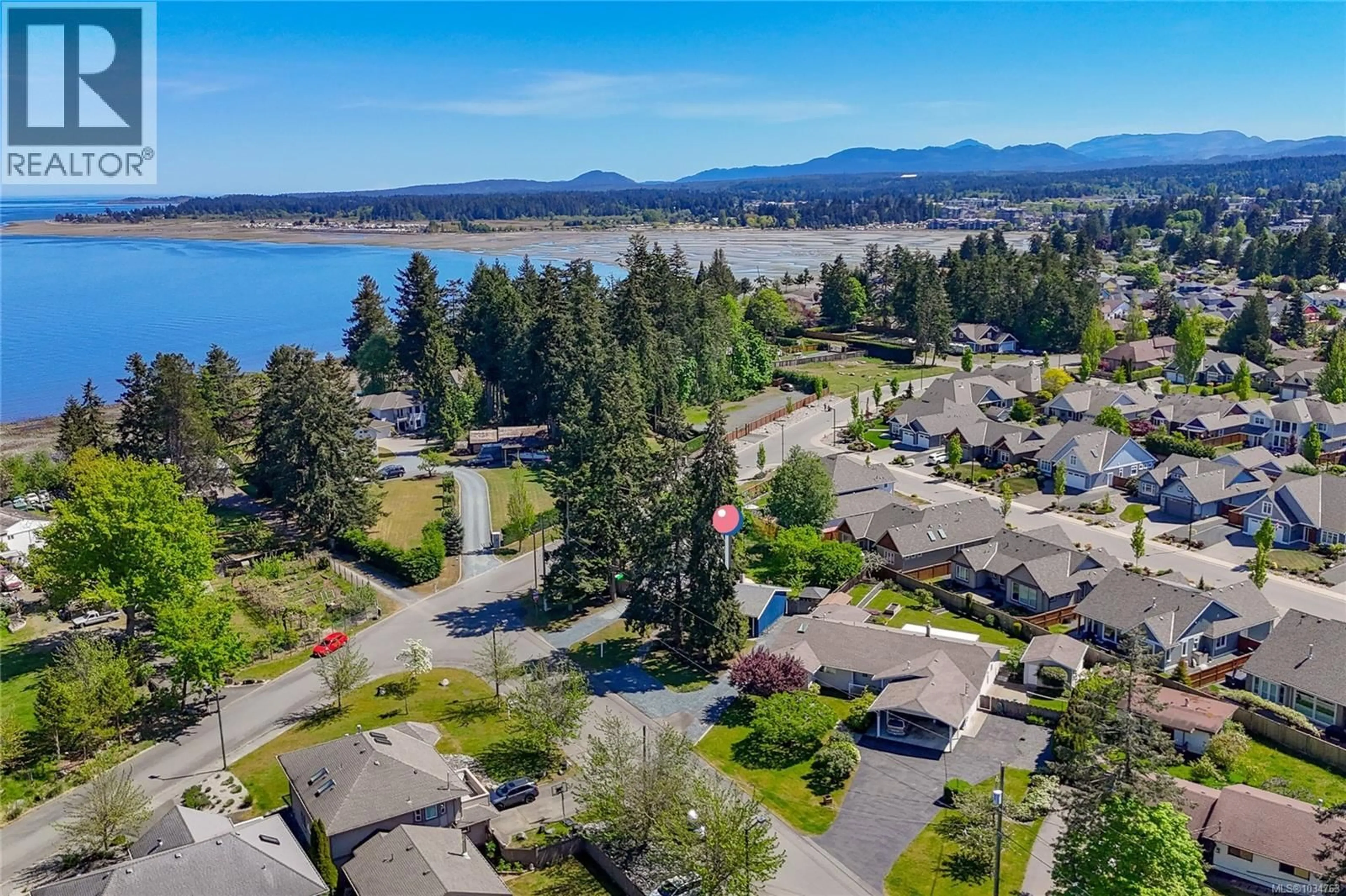 A pic from outside/outdoor area/front of a property/back of a property/a pic from drone, water/lake/river/ocean view for 610 CHINOOK AVENUE, Parksville British Columbia V9P1A5
