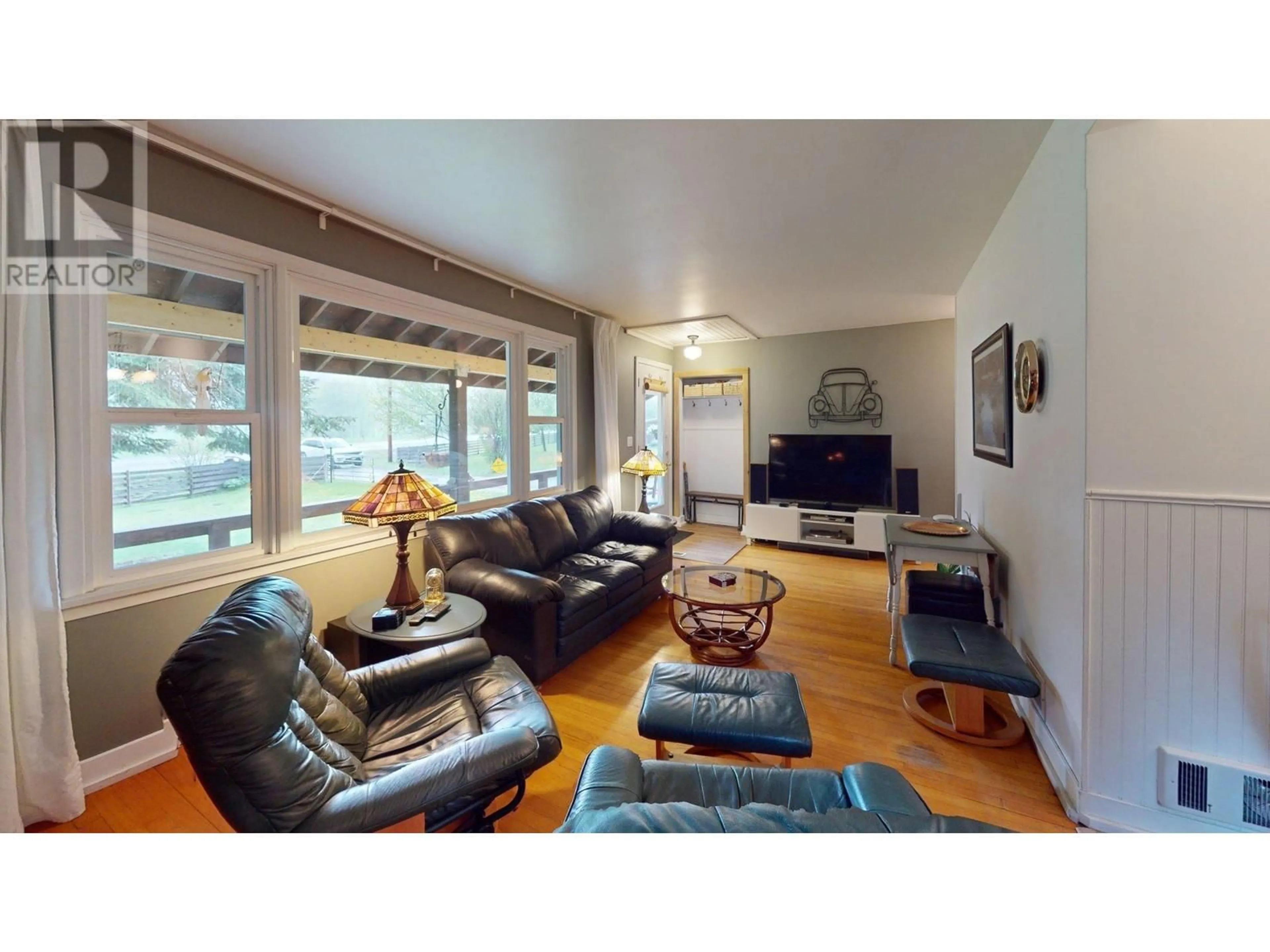 Living room with furniture, wood/laminate floor for 60 HIGHWAY 22 OTHER, Rossland British Columbia V0G1Y0