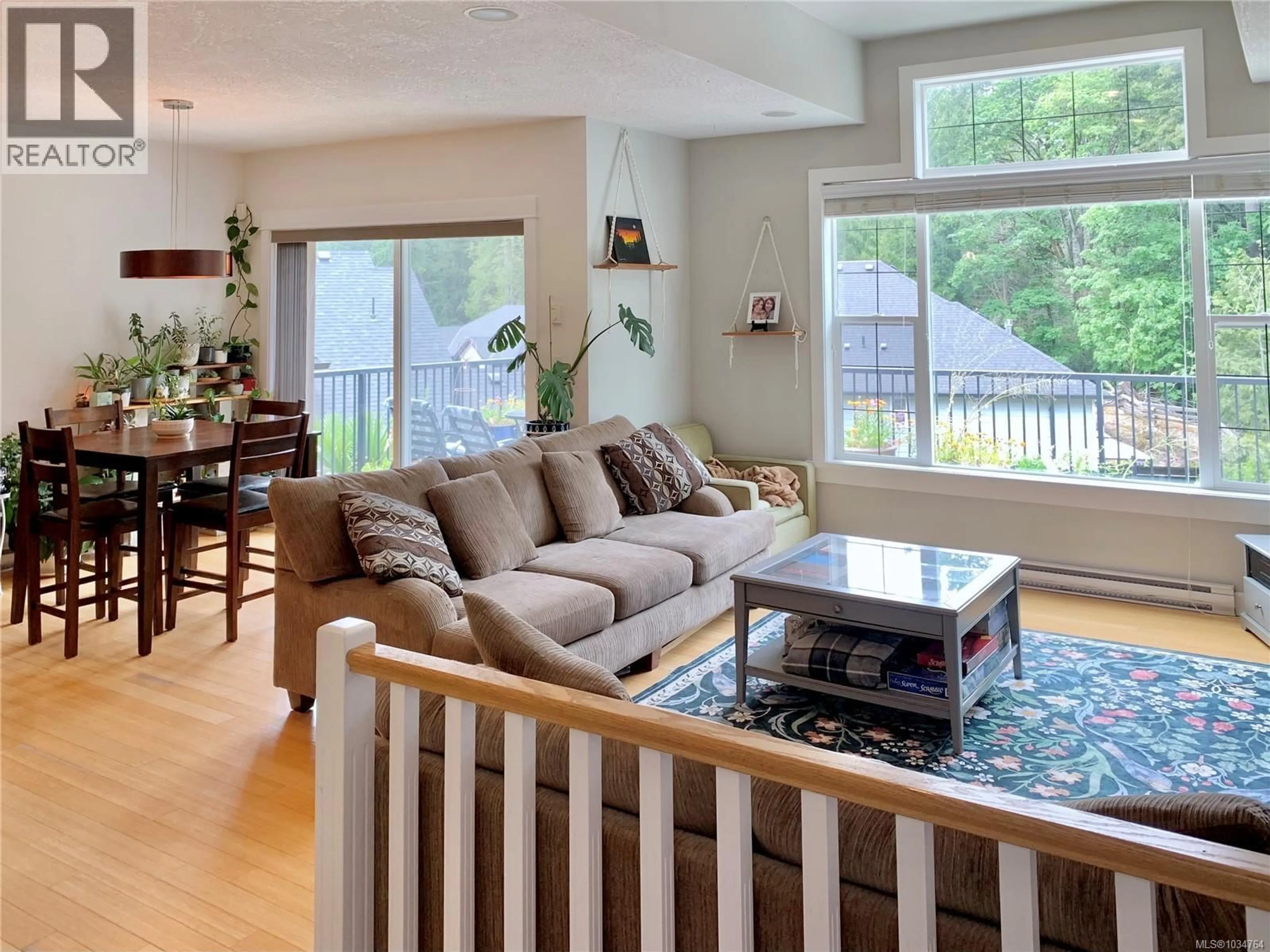 Living room with furniture, wood/laminate floor for 3379 SEWELL LANE, Colwood British Columbia V9C0C1