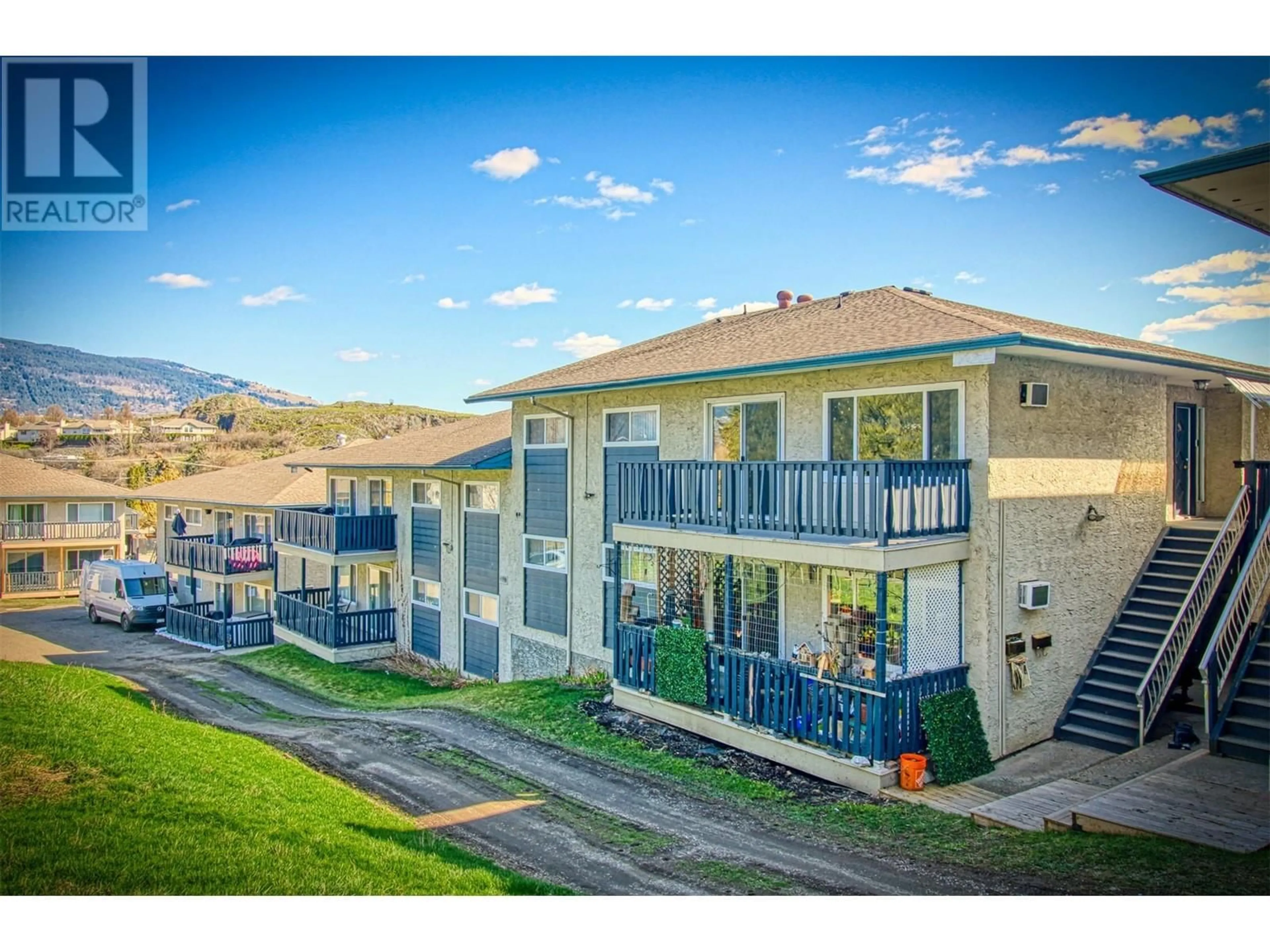 A pic from outside/outdoor area/front of a property/back of a property/a pic from drone, mountain view for 222 - 3505 38 STREET, Vernon British Columbia V1T6X1