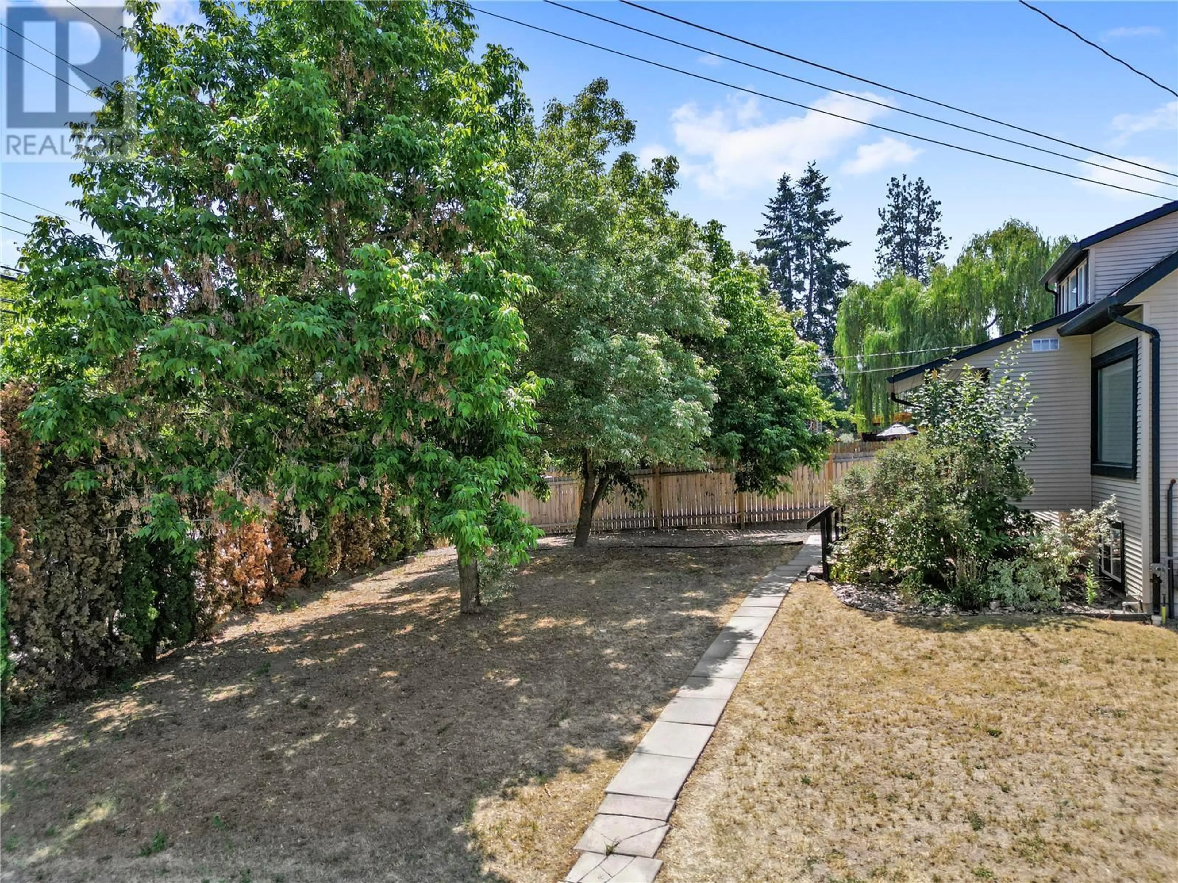 A pic from outside/outdoor area/front of a property/back of a property/a pic from drone, street for 11592 OKANAGAN CENTRE ROAD EAST, Lake Country British Columbia V4V1G4