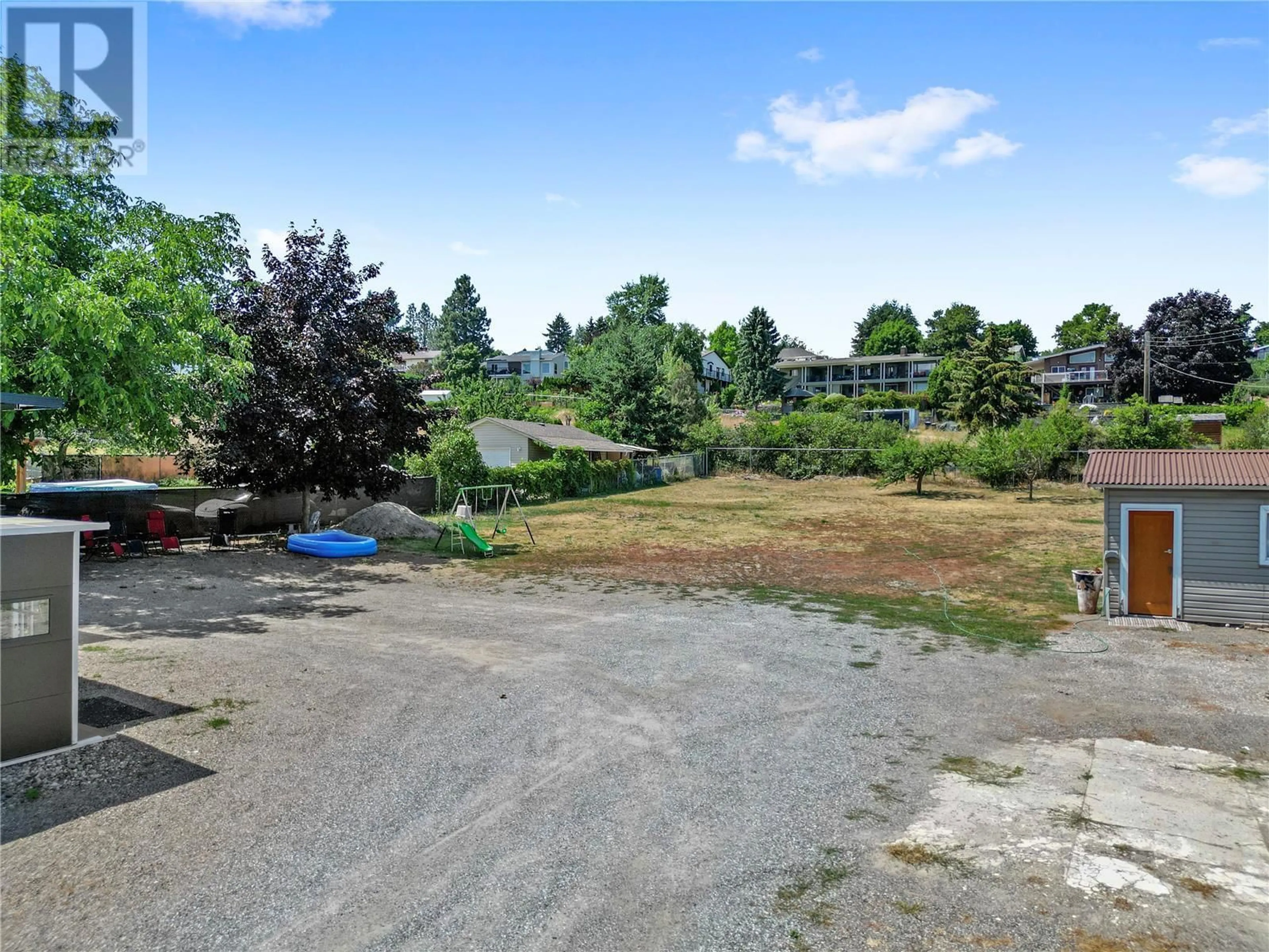 A pic from outside/outdoor area/front of a property/back of a property/a pic from drone, street for 11592 OKANAGAN CENTRE ROAD EAST, Lake Country British Columbia V4V1G4