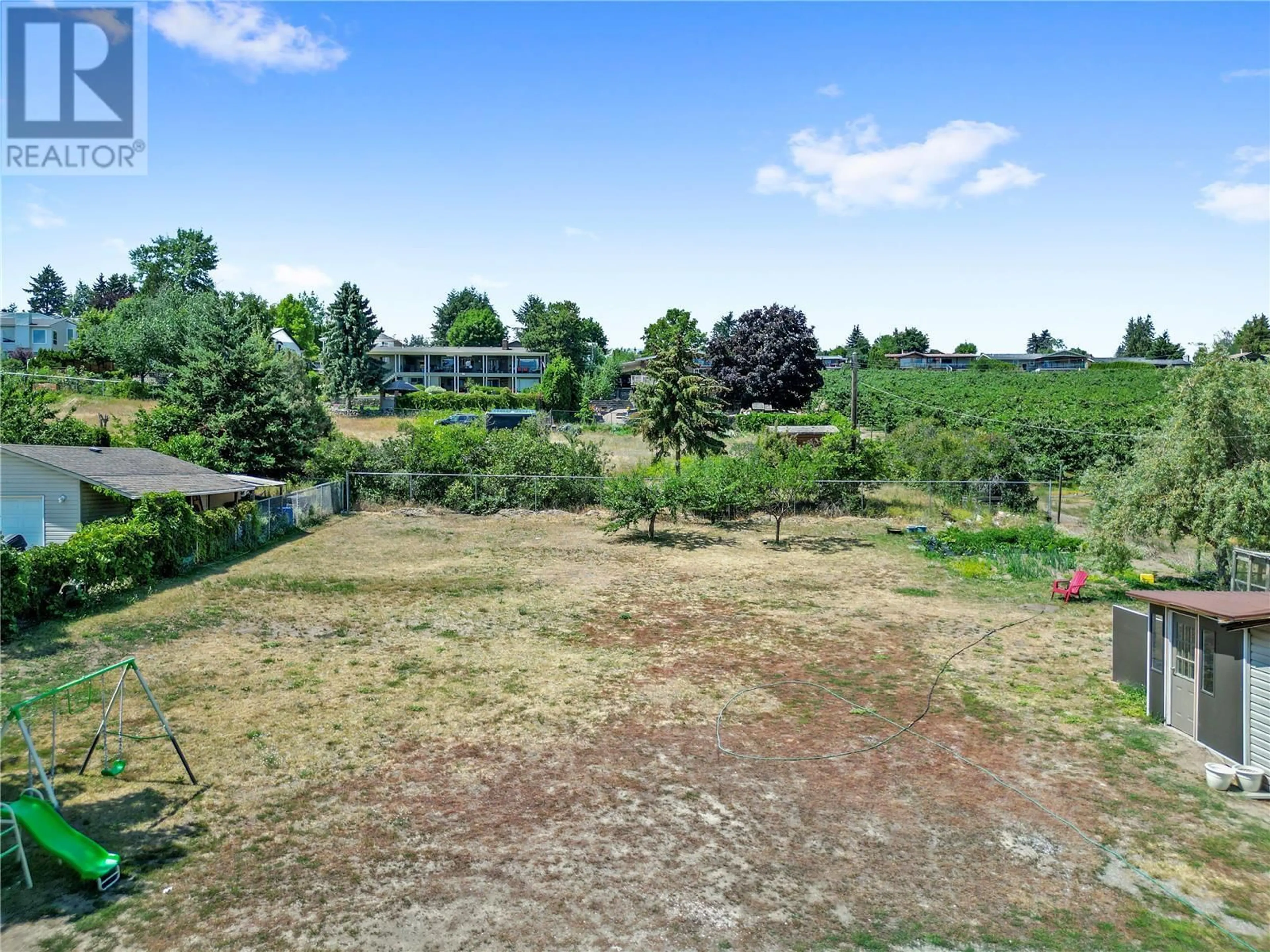 A pic from outside/outdoor area/front of a property/back of a property/a pic from drone, unknown for 11592 OKANAGAN CENTRE ROAD EAST, Lake Country British Columbia V4V1G4