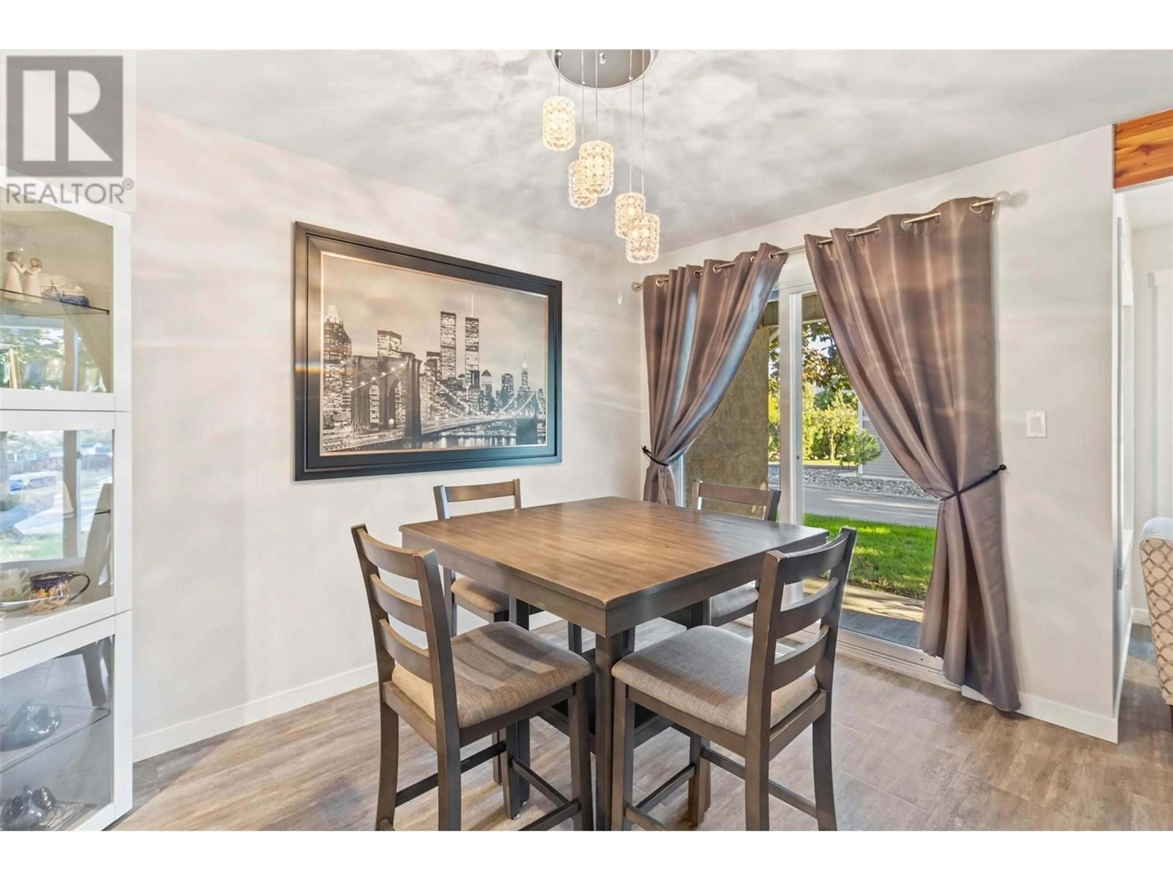 Dining room, wood/laminate floor for 3 - 763 FRONT STREET, Kamloops British Columbia V2C6S8