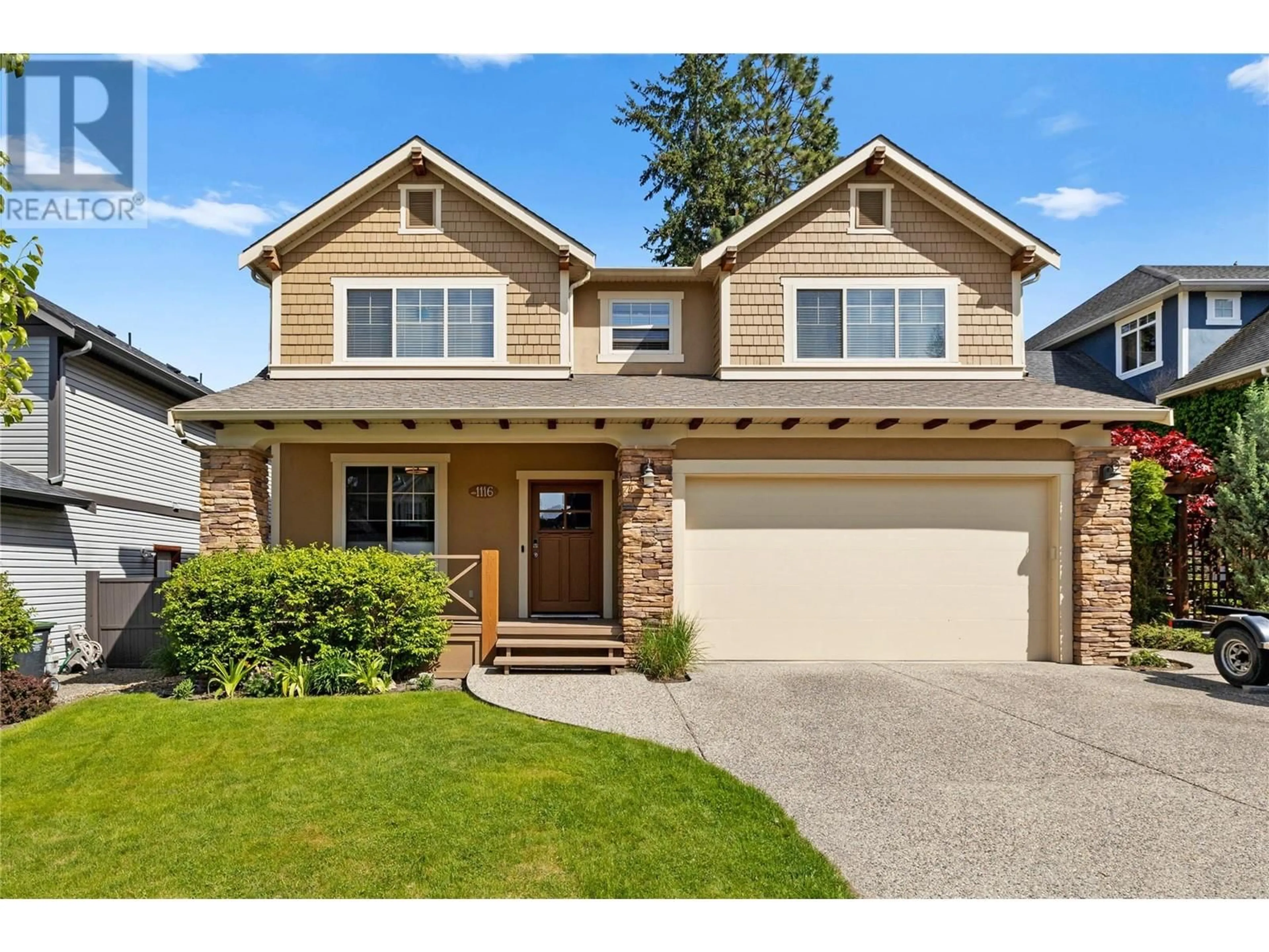 Home with vinyl exterior material, street for 1116 PARET CRESCENT, Kelowna British Columbia V1W4X8