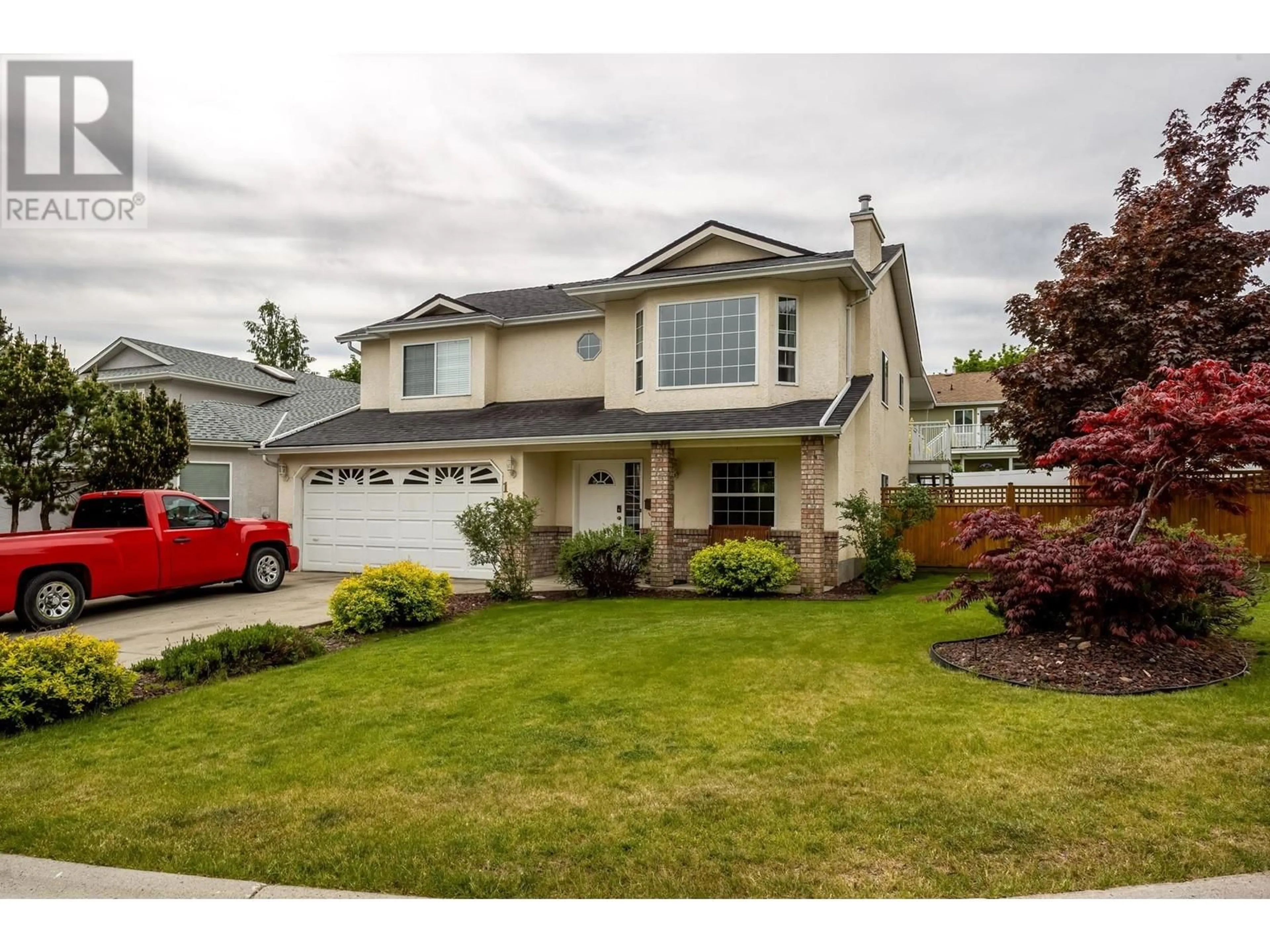 Home with vinyl exterior material, street for 1871 RANCHMONT CRESCENT, Kelowna British Columbia V1V1T4