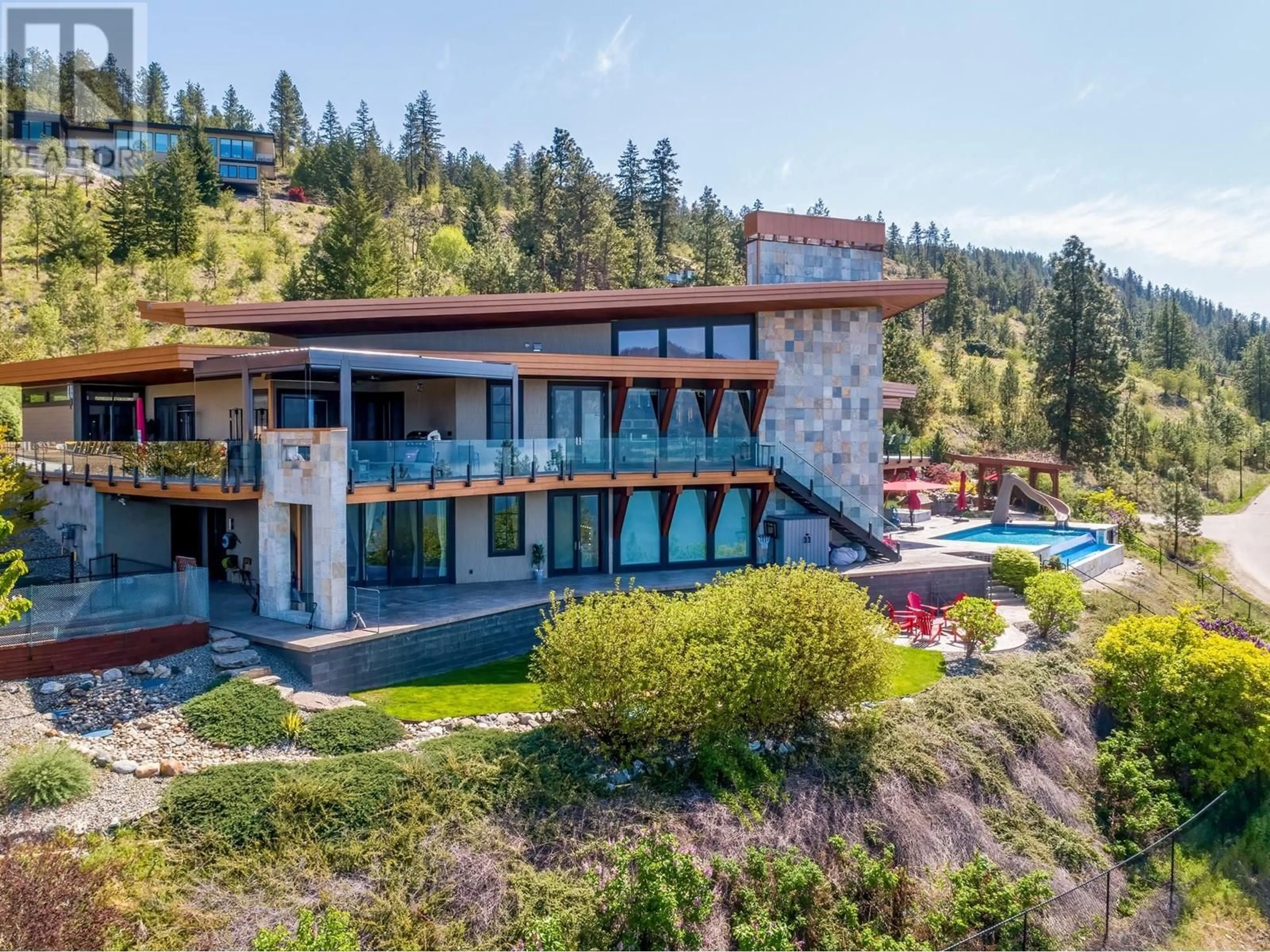 A pic from outside/outdoor area/front of a property/back of a property/a pic from drone, mountain view for 13889 OGILVEY LANE, Lake Country British Columbia V4V2S8