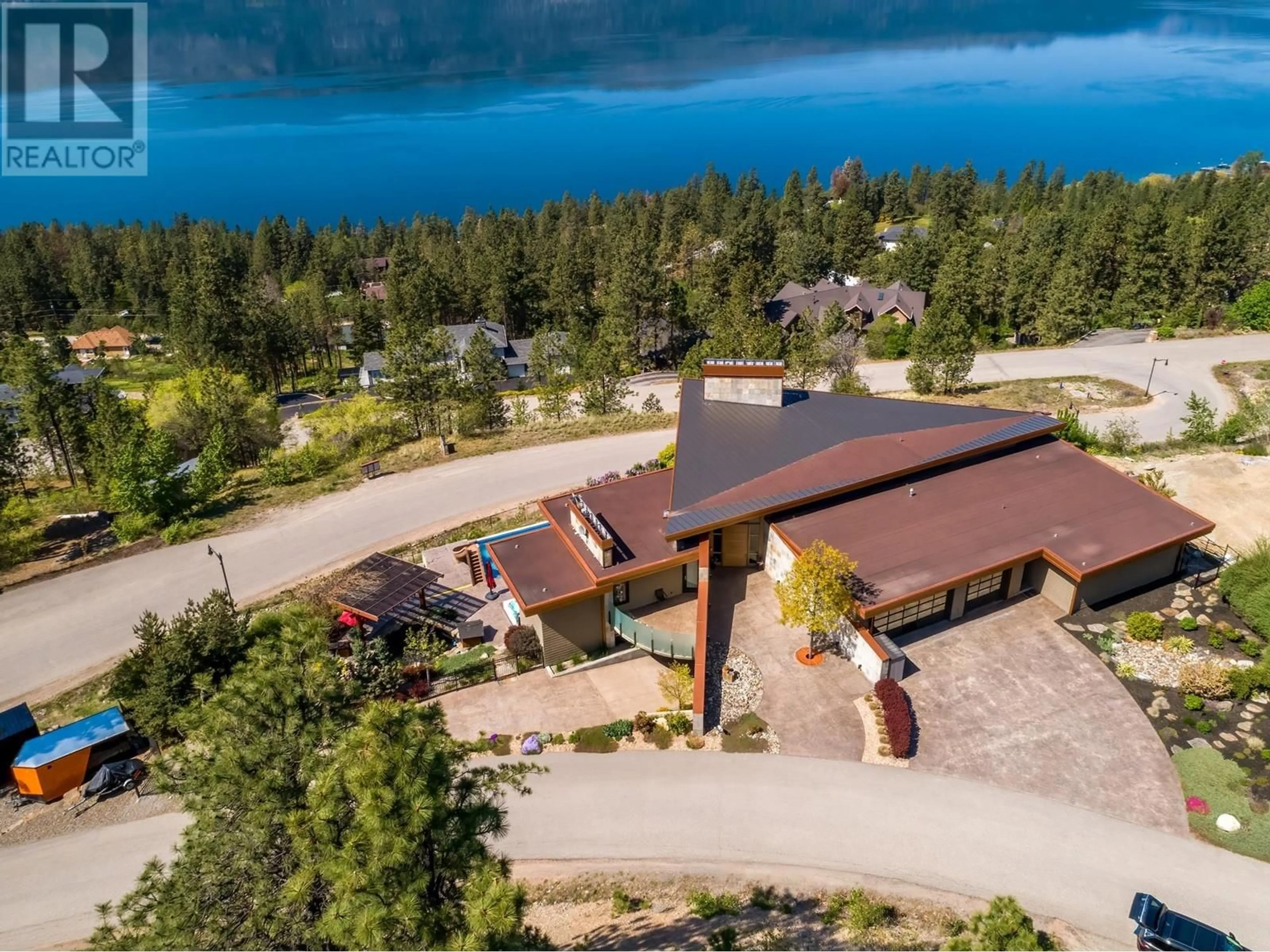 A pic from outside/outdoor area/front of a property/back of a property/a pic from drone, water/lake/river/ocean view for 13889 OGILVEY LANE, Lake Country British Columbia V4V2S8