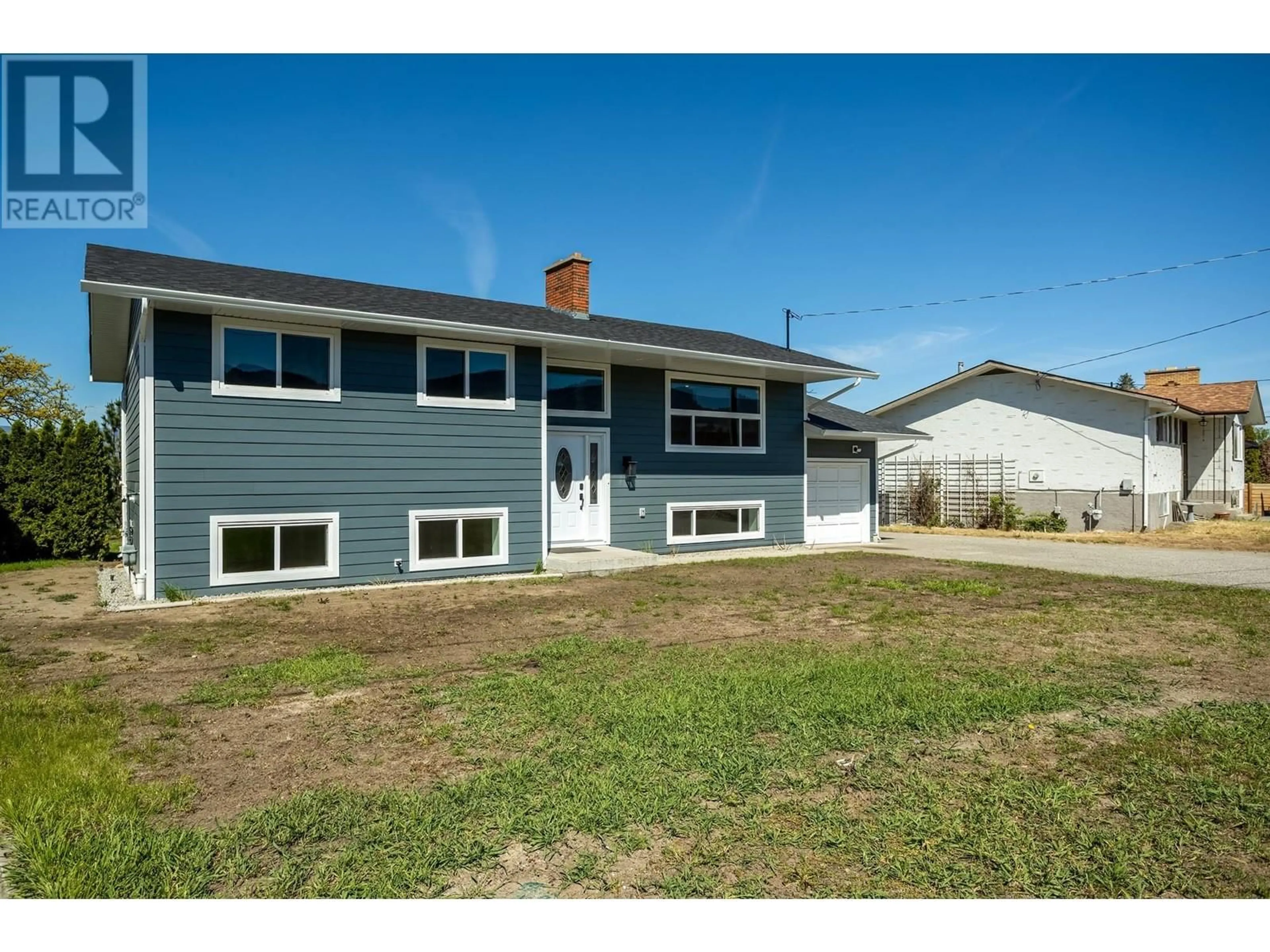 Home with vinyl exterior material, street for 780 DOUGALL ROAD, Kelowna British Columbia V1X3J8