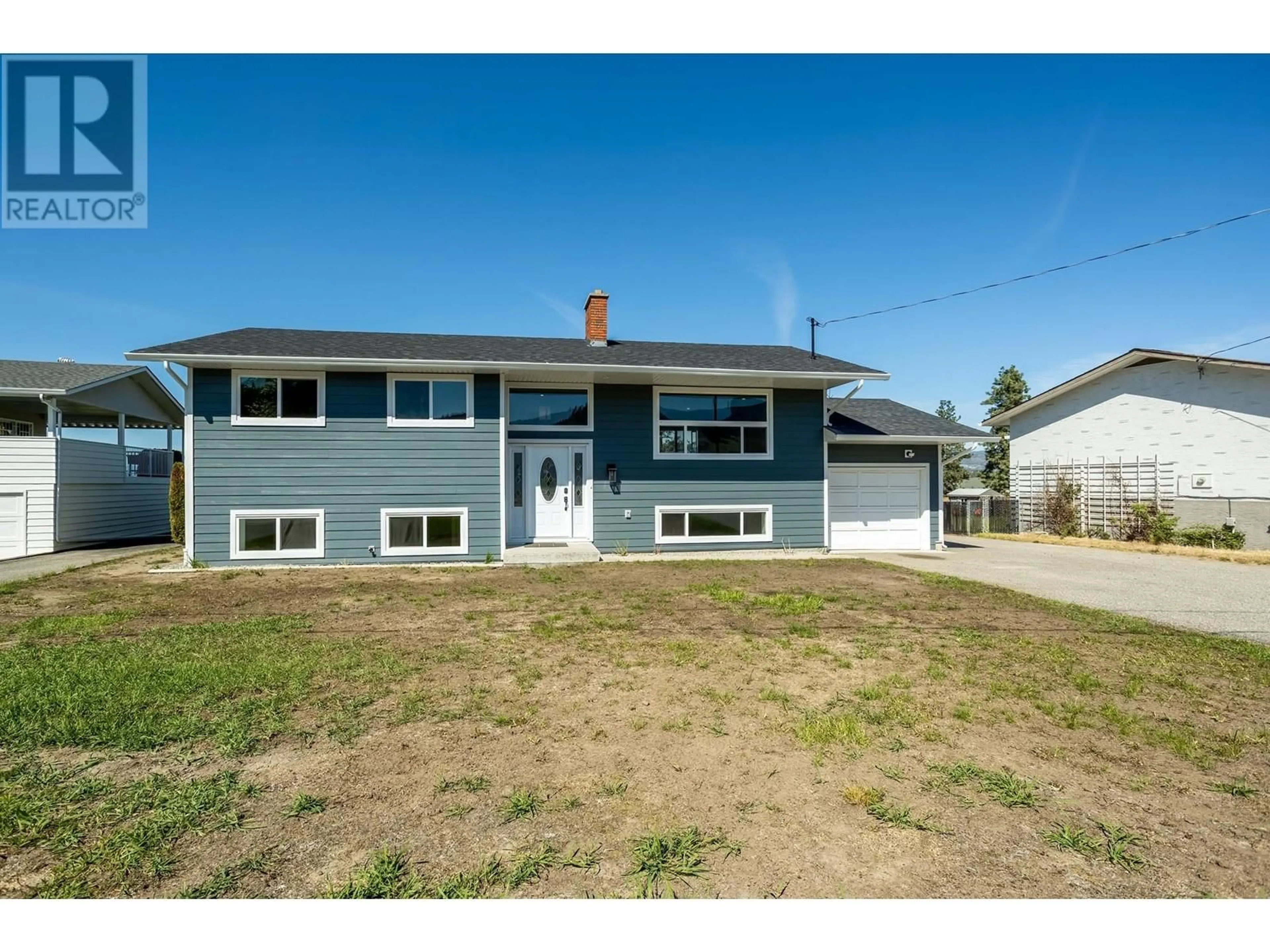 Home with vinyl exterior material, street for 780 DOUGALL ROAD, Kelowna British Columbia V1X3J8