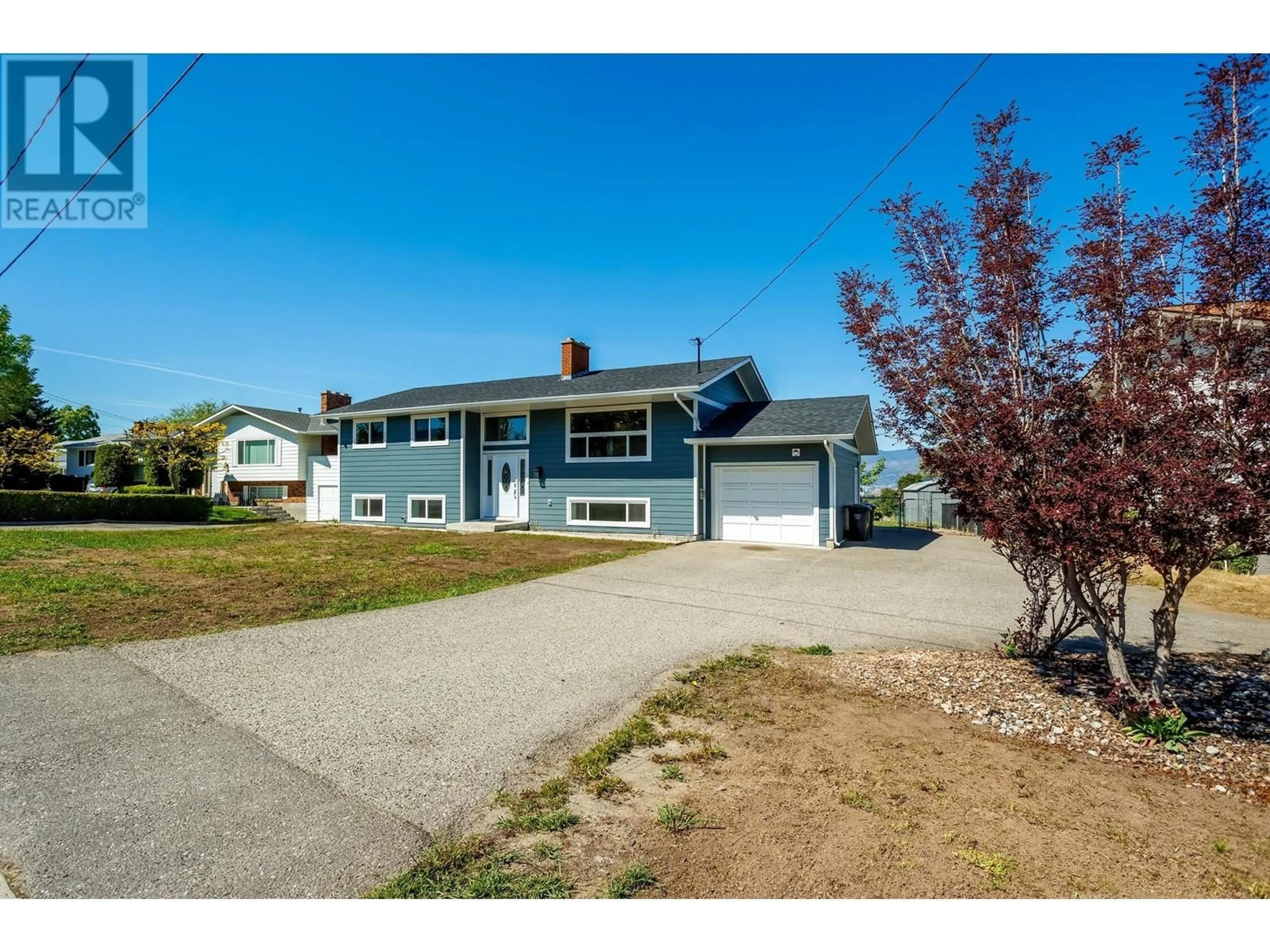 Home with vinyl exterior material, street for 780 DOUGALL ROAD, Kelowna British Columbia V1X3J8