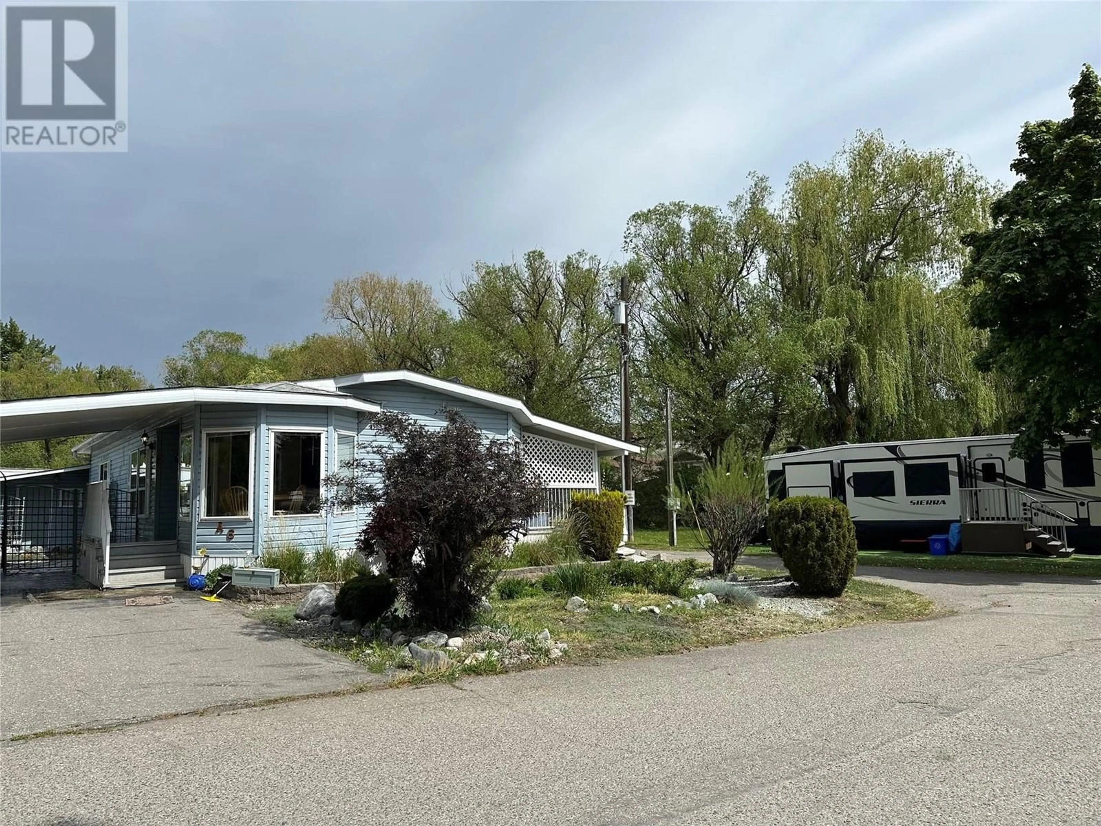 Home with vinyl exterior material, street for A6 - 5484 25 AVENUE, Vernon British Columbia V1T7A8