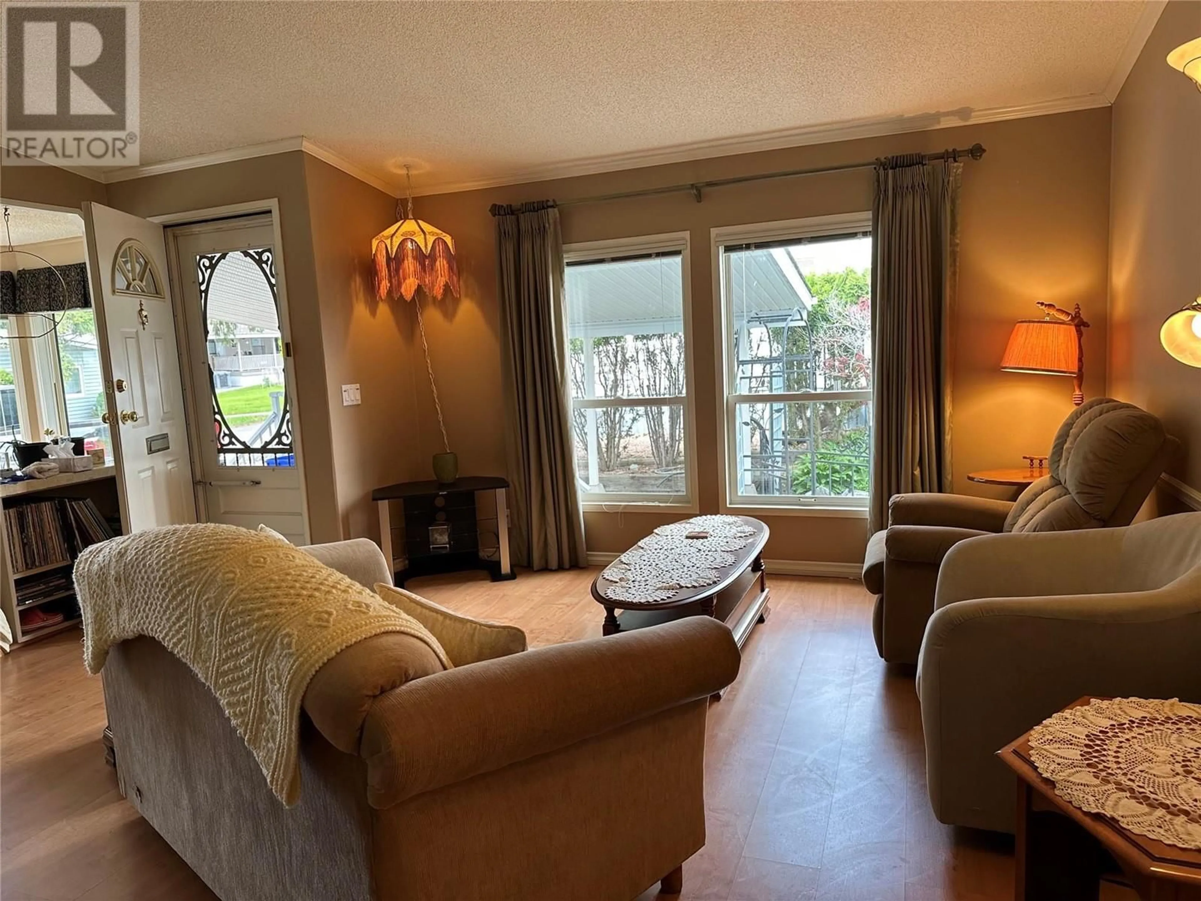 Living room with furniture, unknown for A6 - 5484 25 AVENUE, Vernon British Columbia V1T7A8