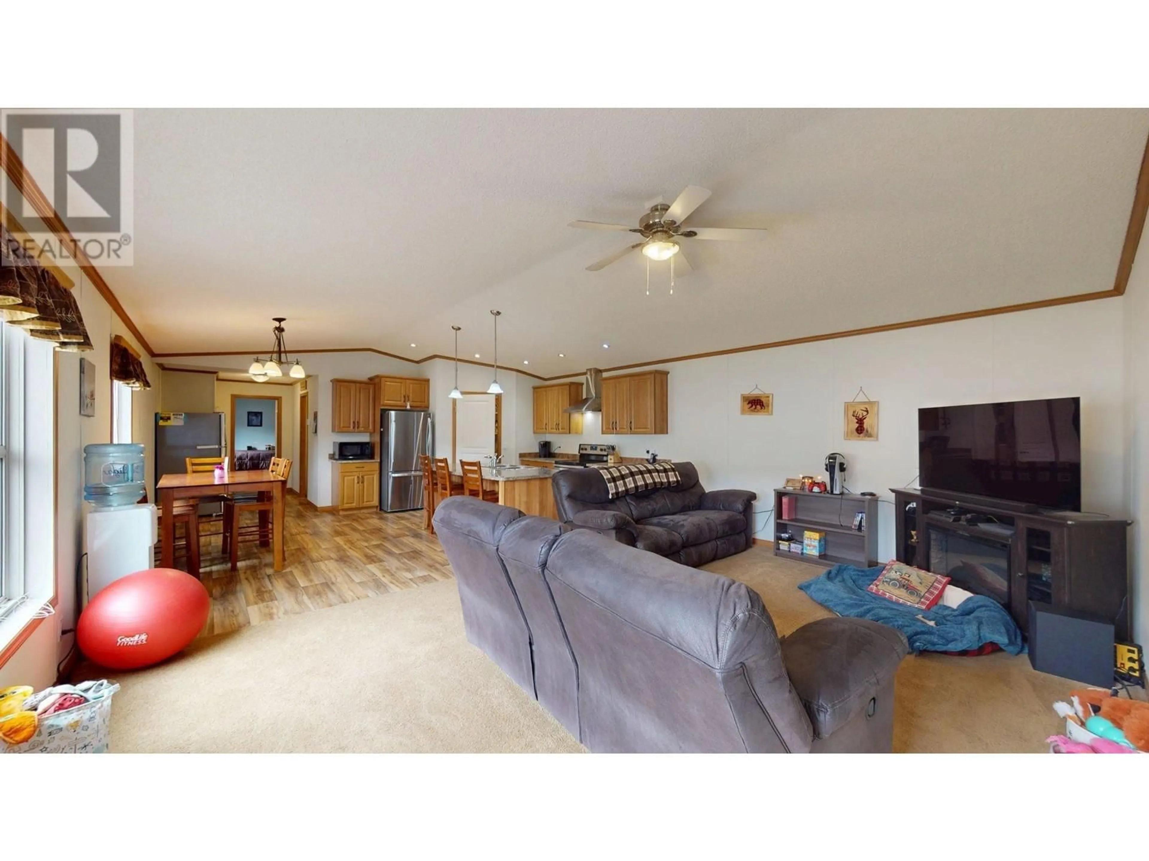 Living room with furniture, wood/laminate floor for 37 WILDERNESS  HEIGHTS WAY, Elkford British Columbia V0B1H0