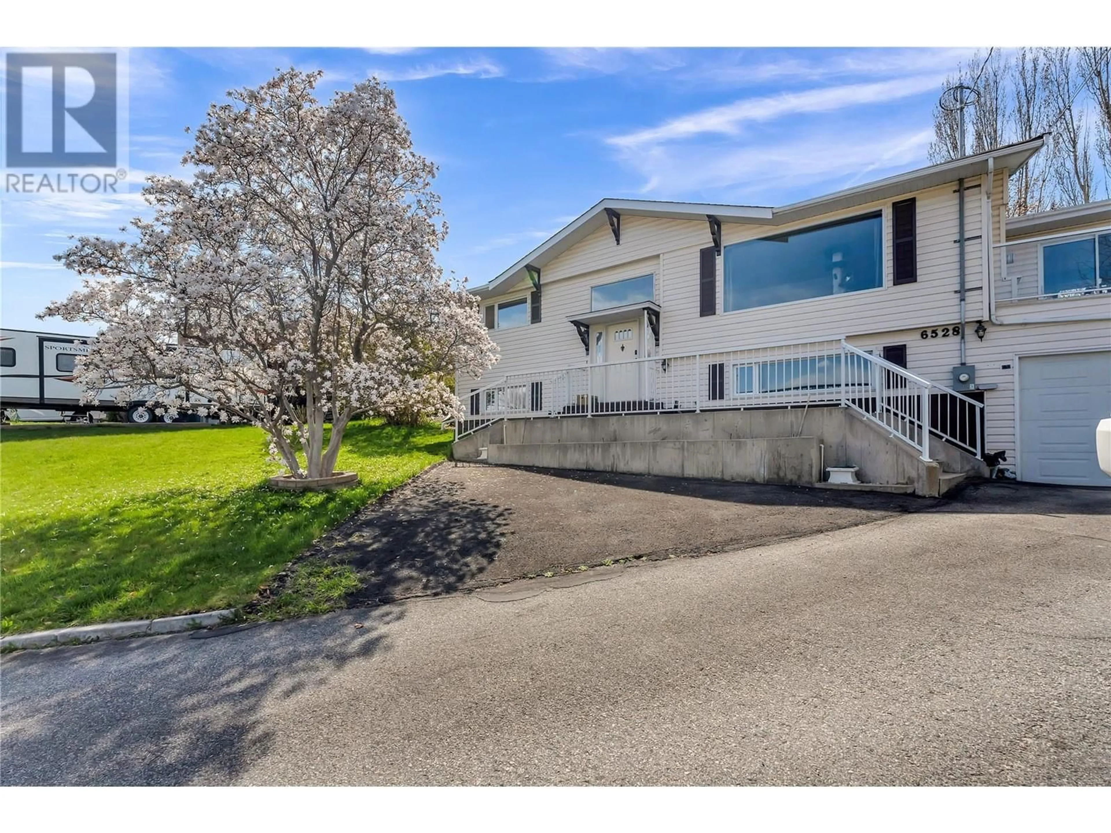 A pic from outside/outdoor area/front of a property/back of a property/a pic from drone, unknown for 6528 LIPSETT CRESCENT, Summerland British Columbia V0H1Z1