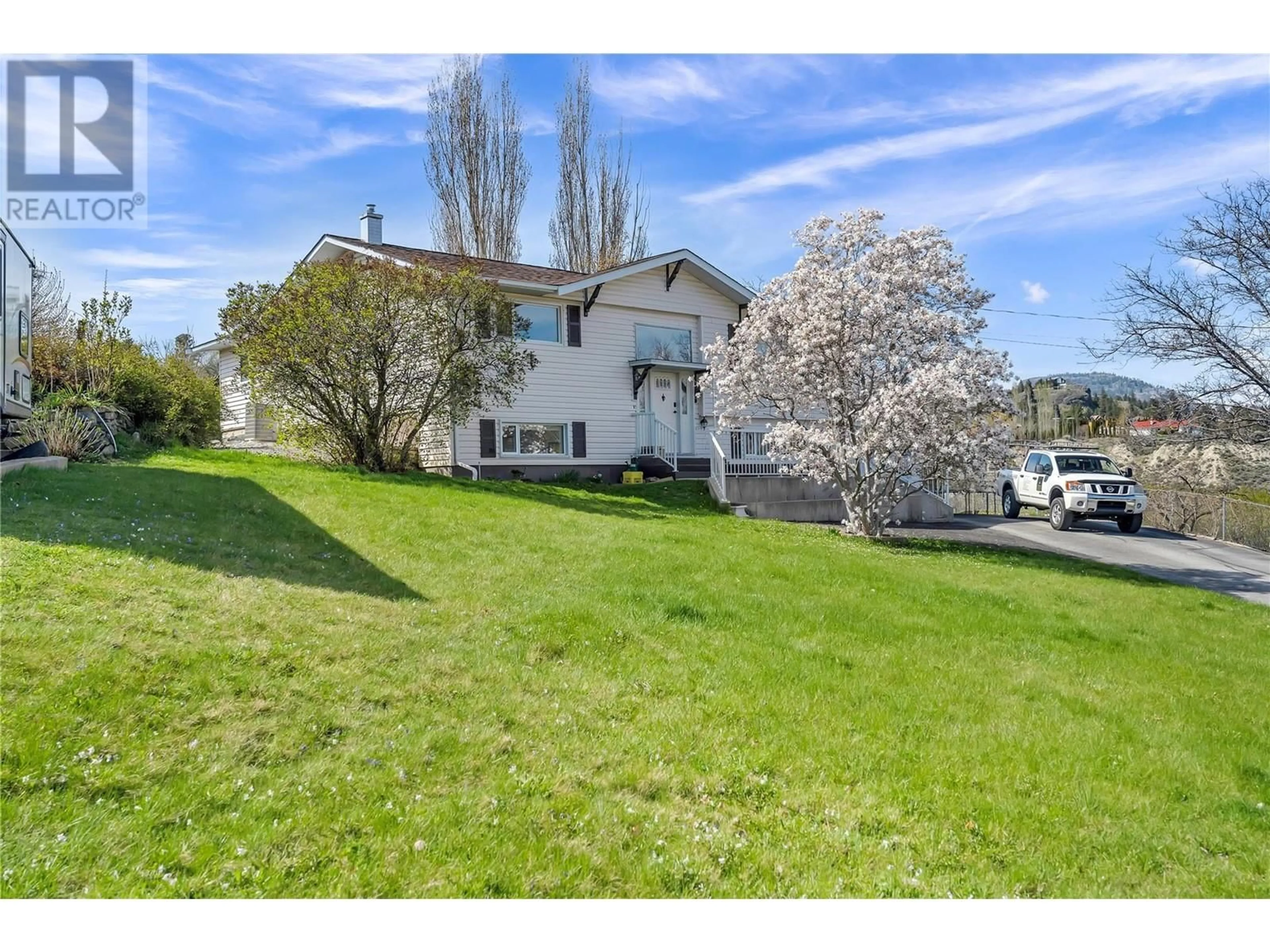 A pic from outside/outdoor area/front of a property/back of a property/a pic from drone, unknown for 6528 LIPSETT CRESCENT, Summerland British Columbia V0H1Z1