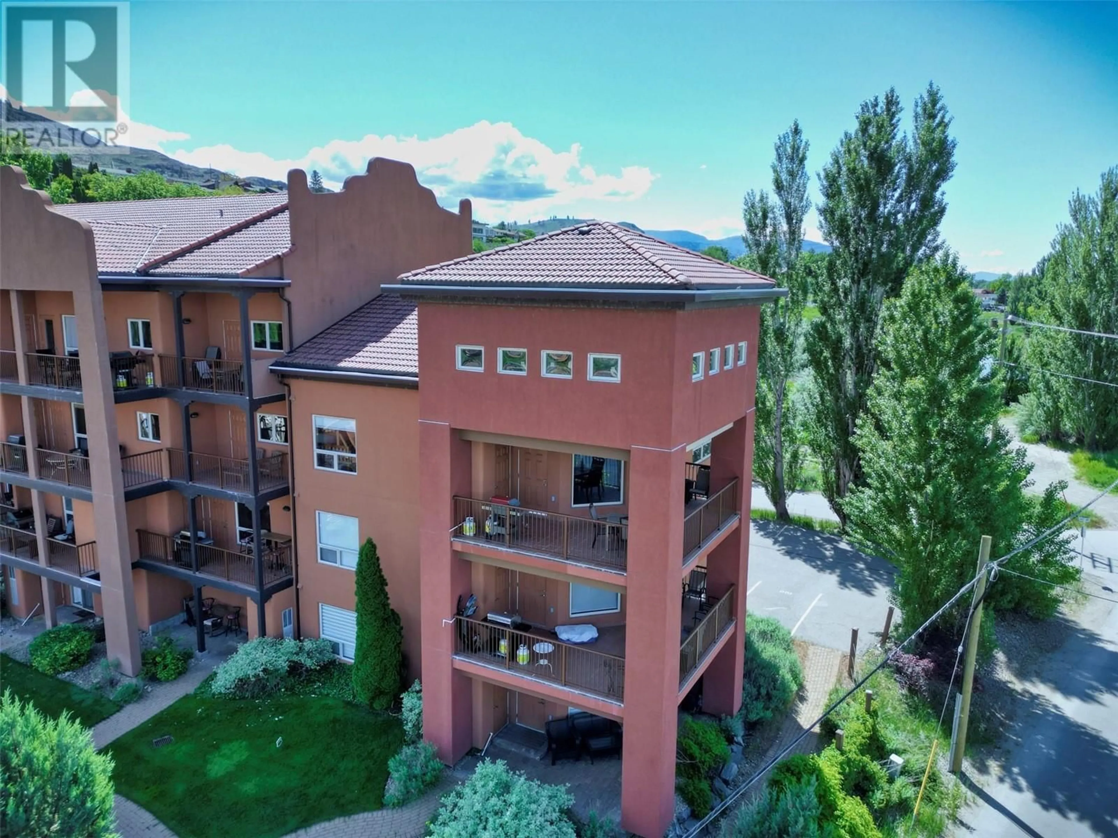 A pic from outside/outdoor area/front of a property/back of a property/a pic from drone, mountain view for 300 - 4300 44TH AVENUE, Osoyoos British Columbia V0H1V6