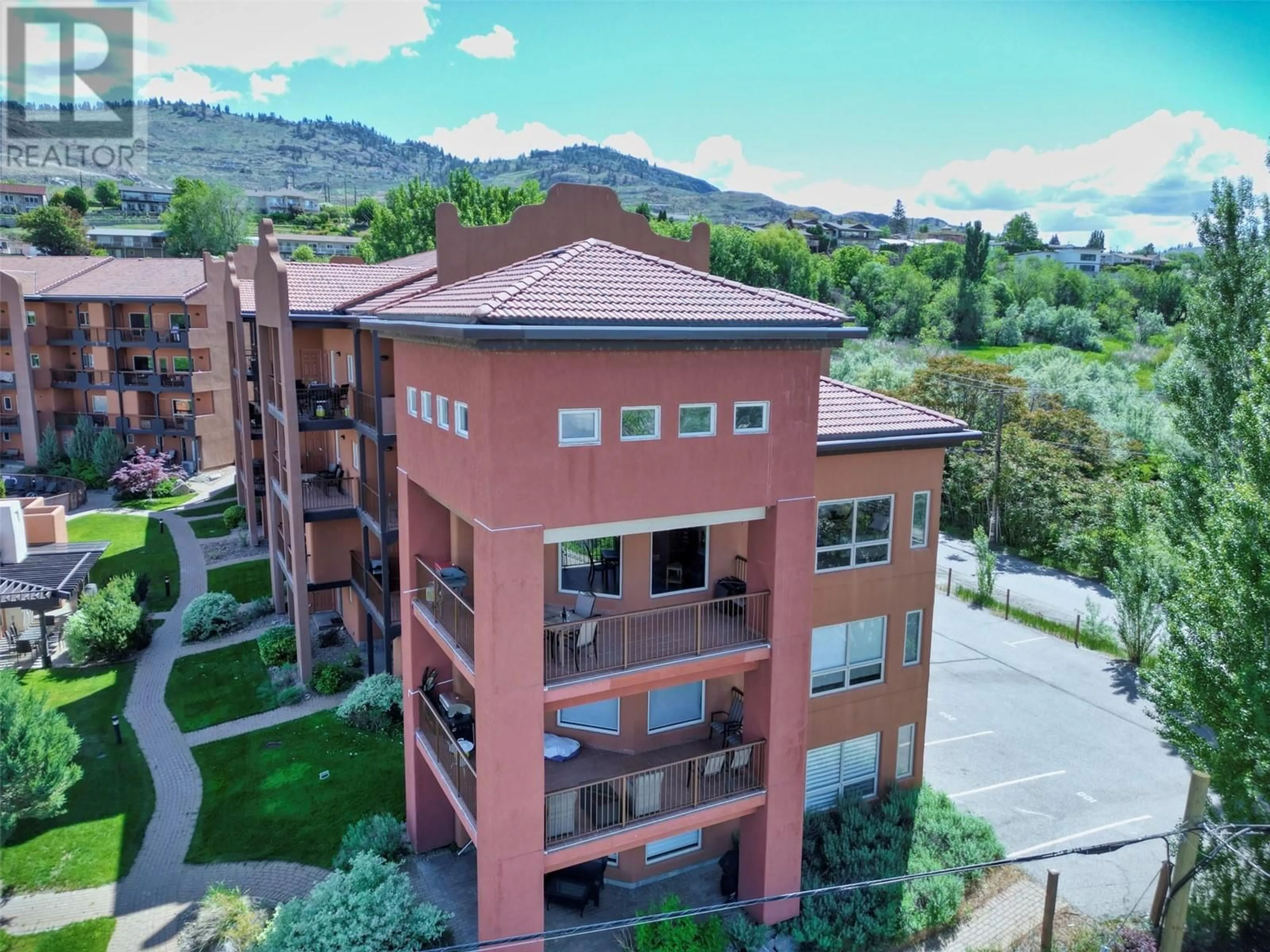 A pic from outside/outdoor area/front of a property/back of a property/a pic from drone, mountain view for 300 - 4300 44TH AVENUE, Osoyoos British Columbia V0H1V6