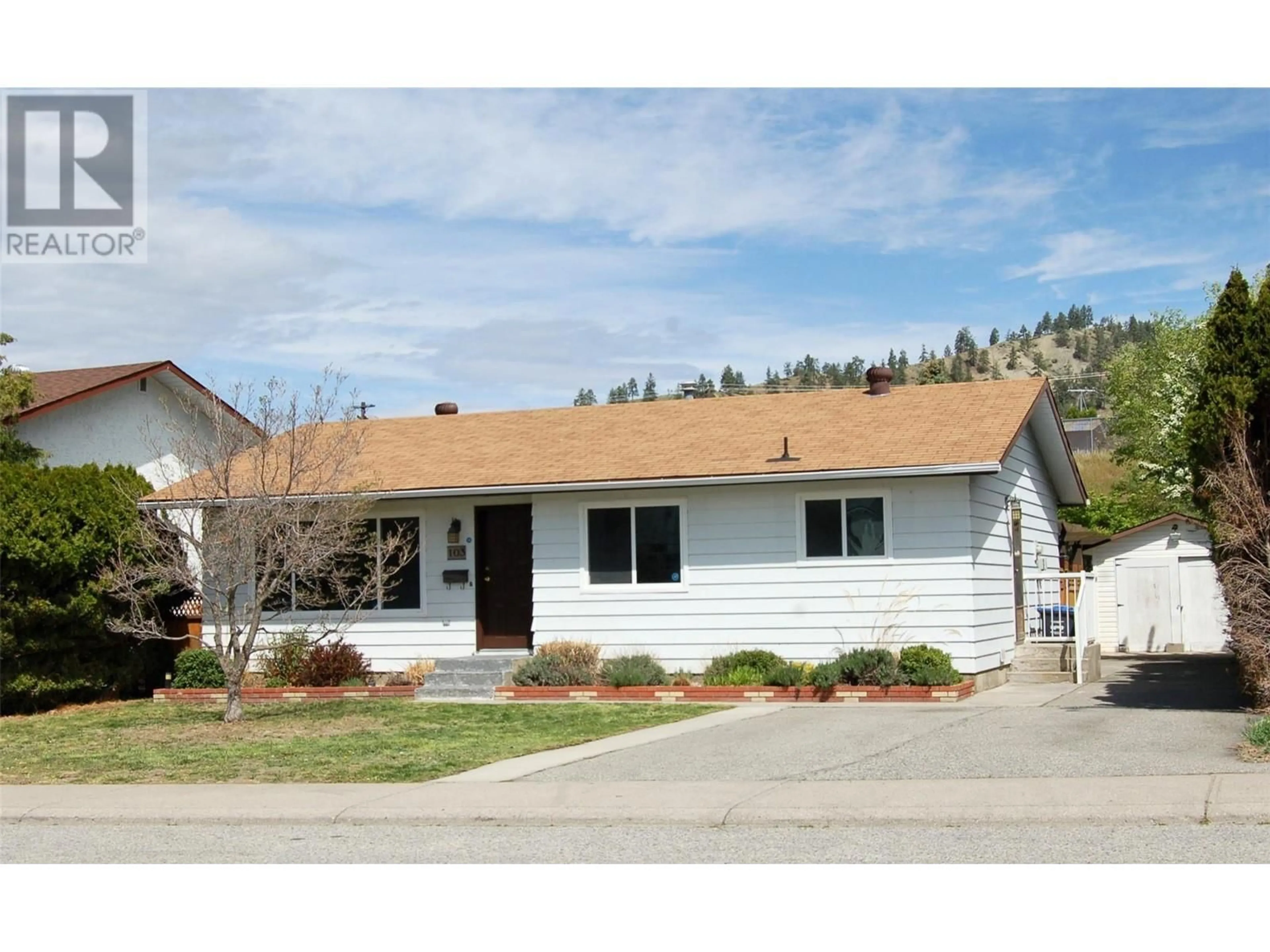 Home with vinyl exterior material, street for 103 CLELAND DRIVE, Penticton British Columbia V2A7H4