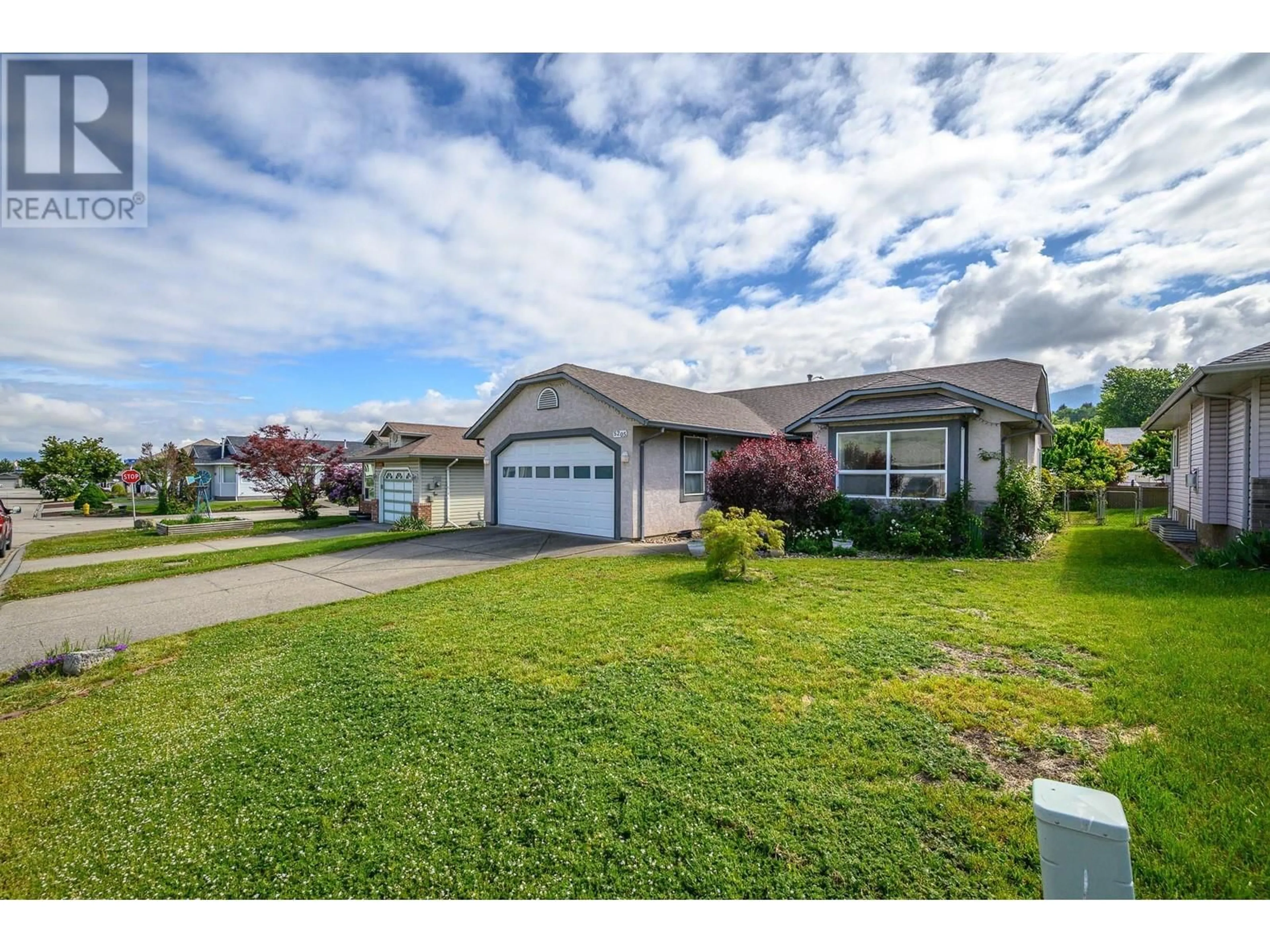 A pic from outside/outdoor area/front of a property/back of a property/a pic from drone, street for 5205 21 STREET, Vernon British Columbia V1T9N2