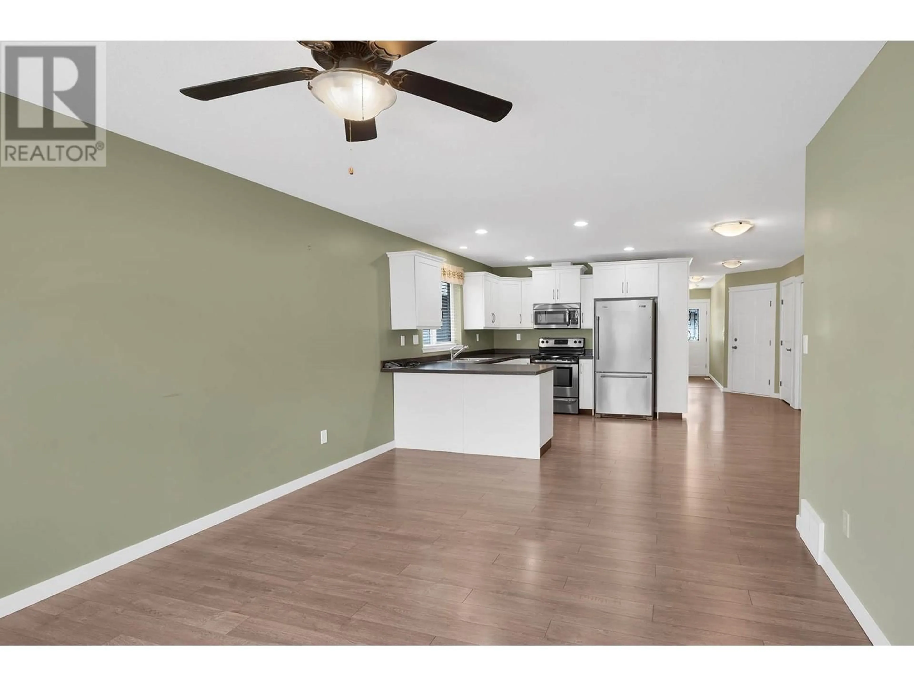 Open concept kitchen, wood/laminate floor for 12 - 2592 CRESTLINE STREET, Kamloops British Columbia V2B0E7