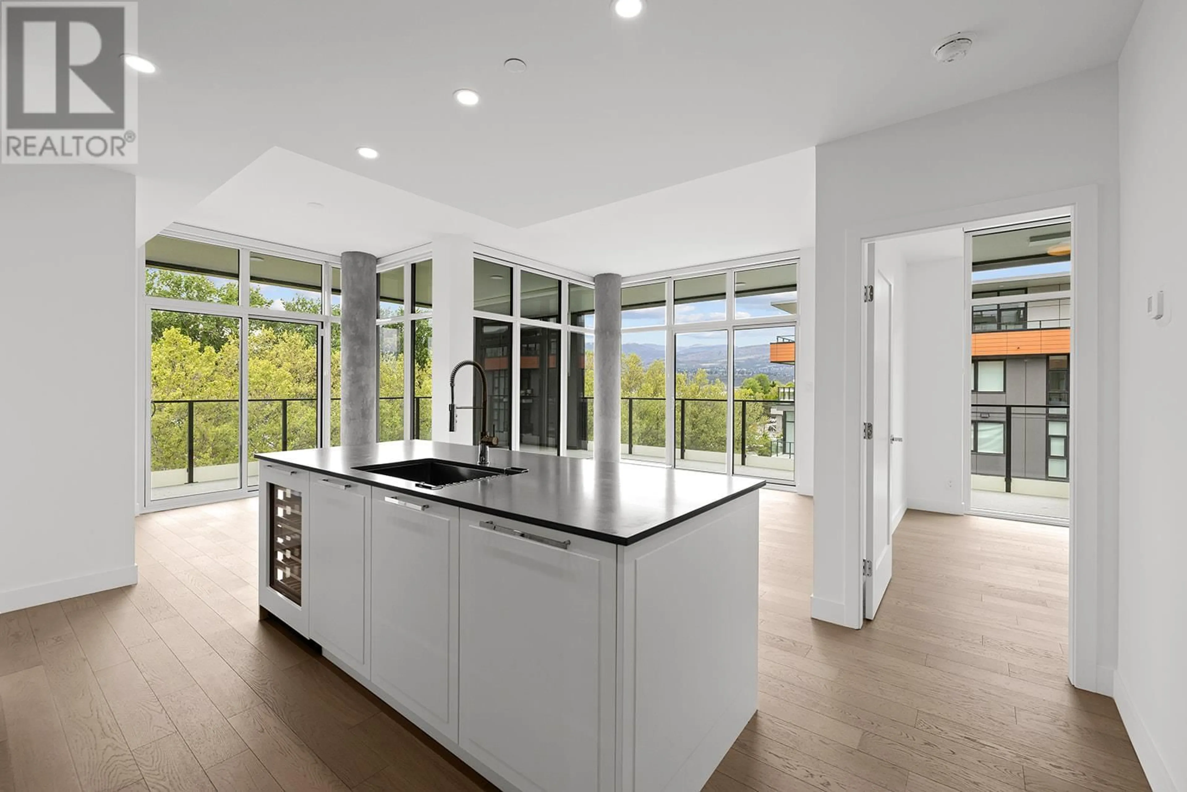 Contemporary kitchen, ceramic/tile floor for 509 - 3409 LAKESHORE ROAD, Kelowna British Columbia V1W3S9