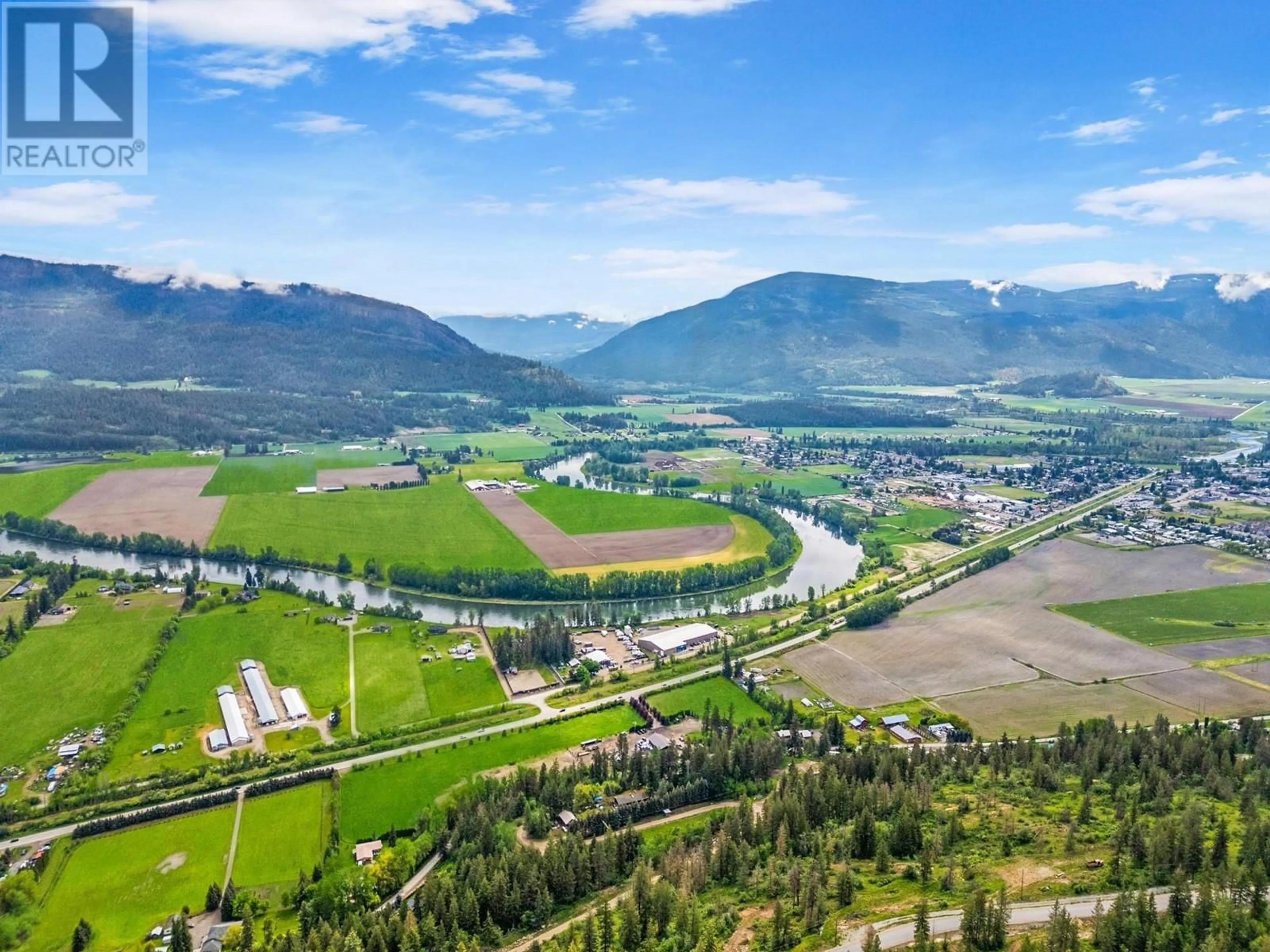 A pic from outside/outdoor area/front of a property/back of a property/a pic from drone, mountain view for 307 OXBOW PLACE, Enderby British Columbia V4Y4G2