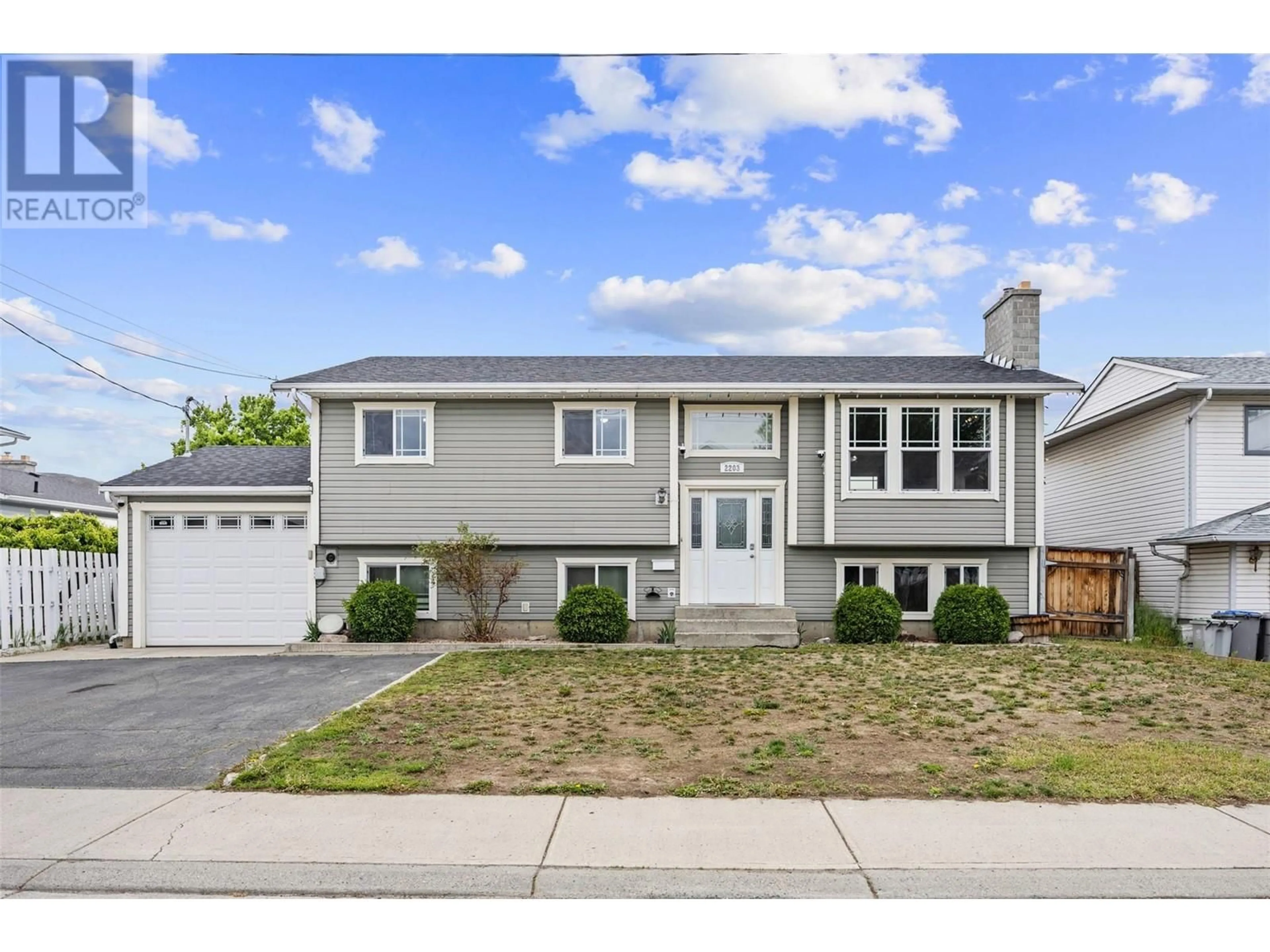 Home with vinyl exterior material, street for 2203 BOSSERT AVENUE, Kamloops British Columbia V2B8H6