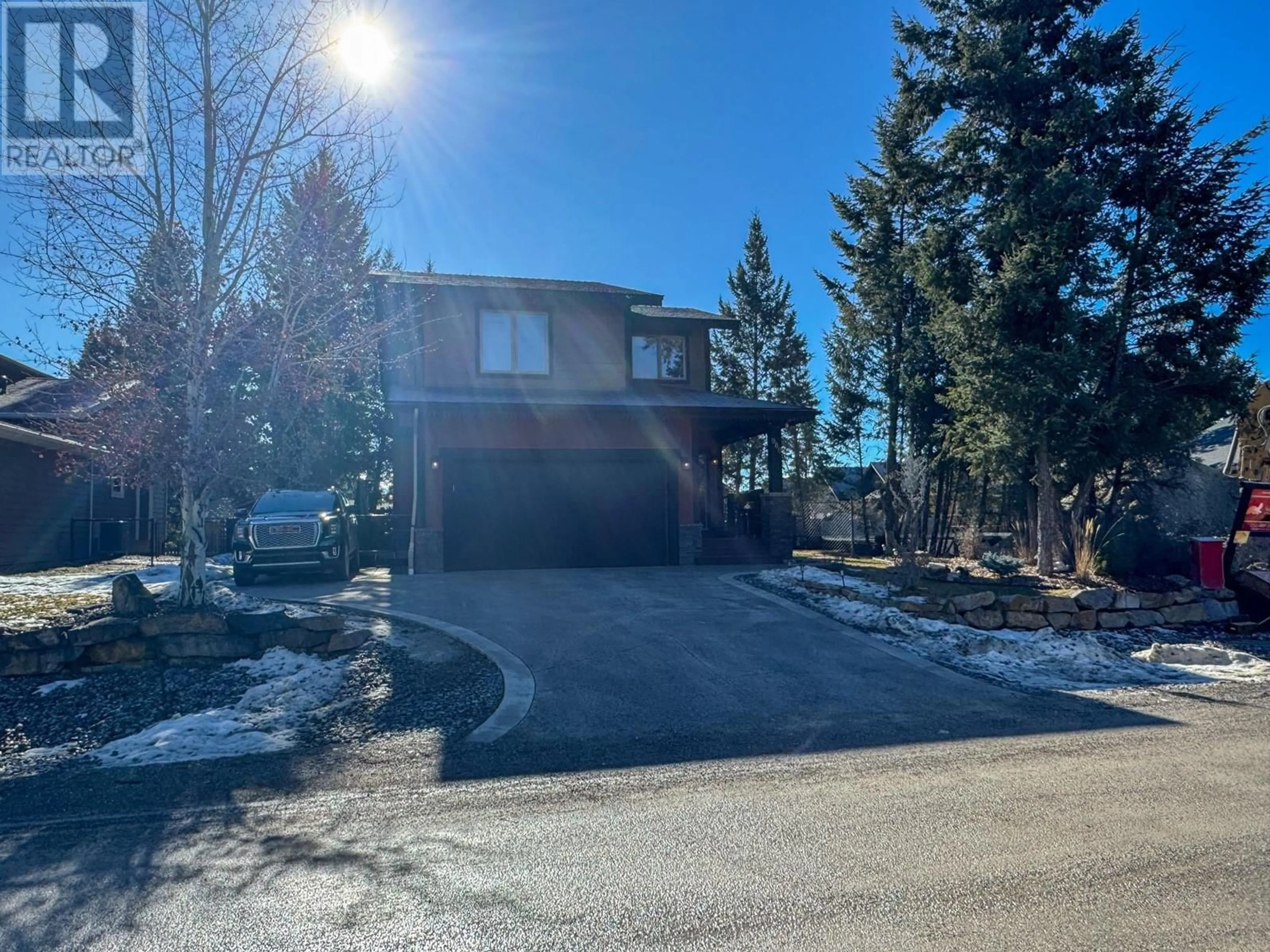 A pic from outside/outdoor area/front of a property/back of a property/a pic from drone, street for 960 COPPER POINT WAY, Invermere British Columbia V0A1K3