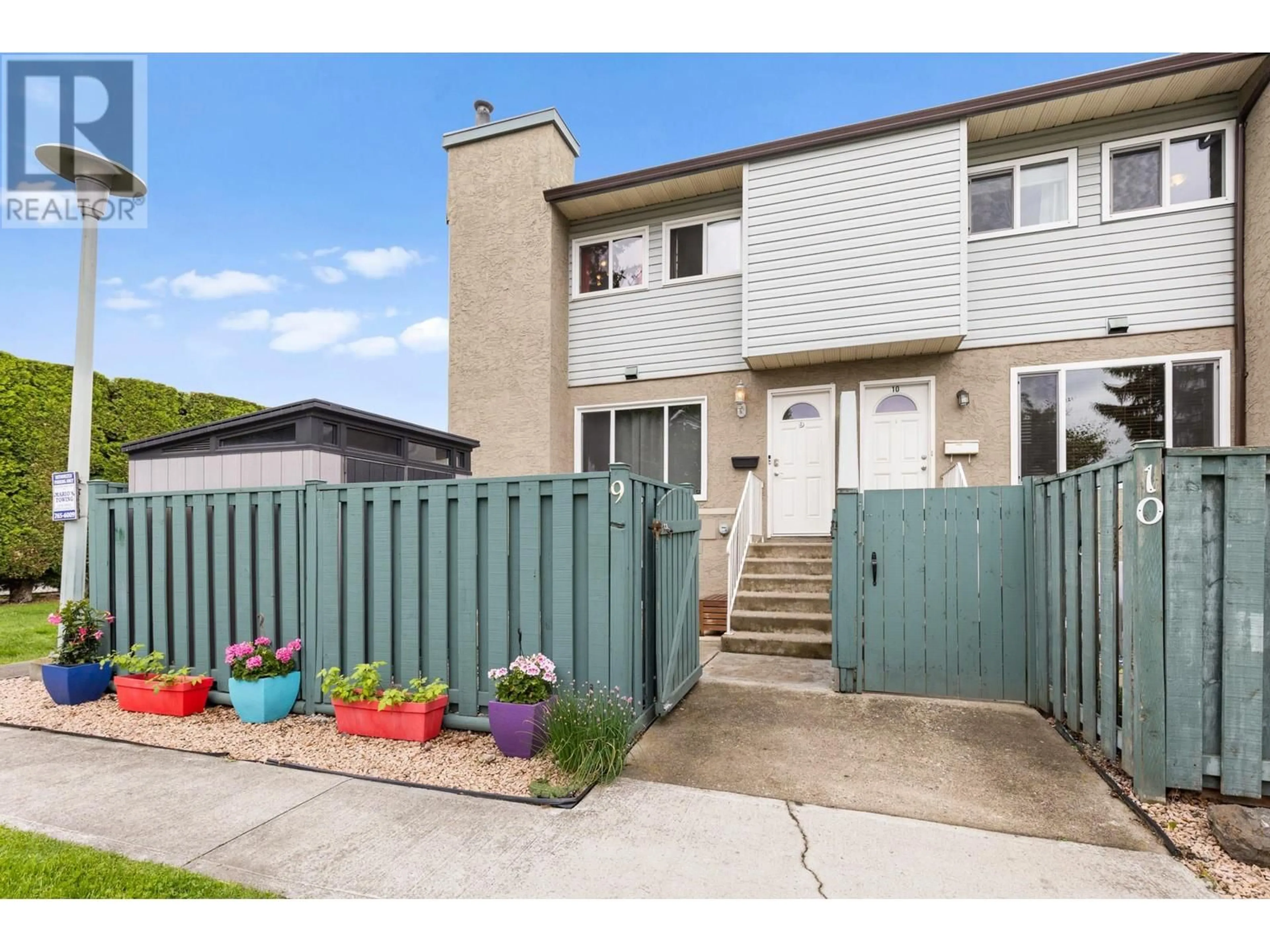 A pic from outside/outdoor area/front of a property/back of a property/a pic from drone, street for 9 - 1471 INKAR ROAD, Kelowna British Columbia V1Y8J1