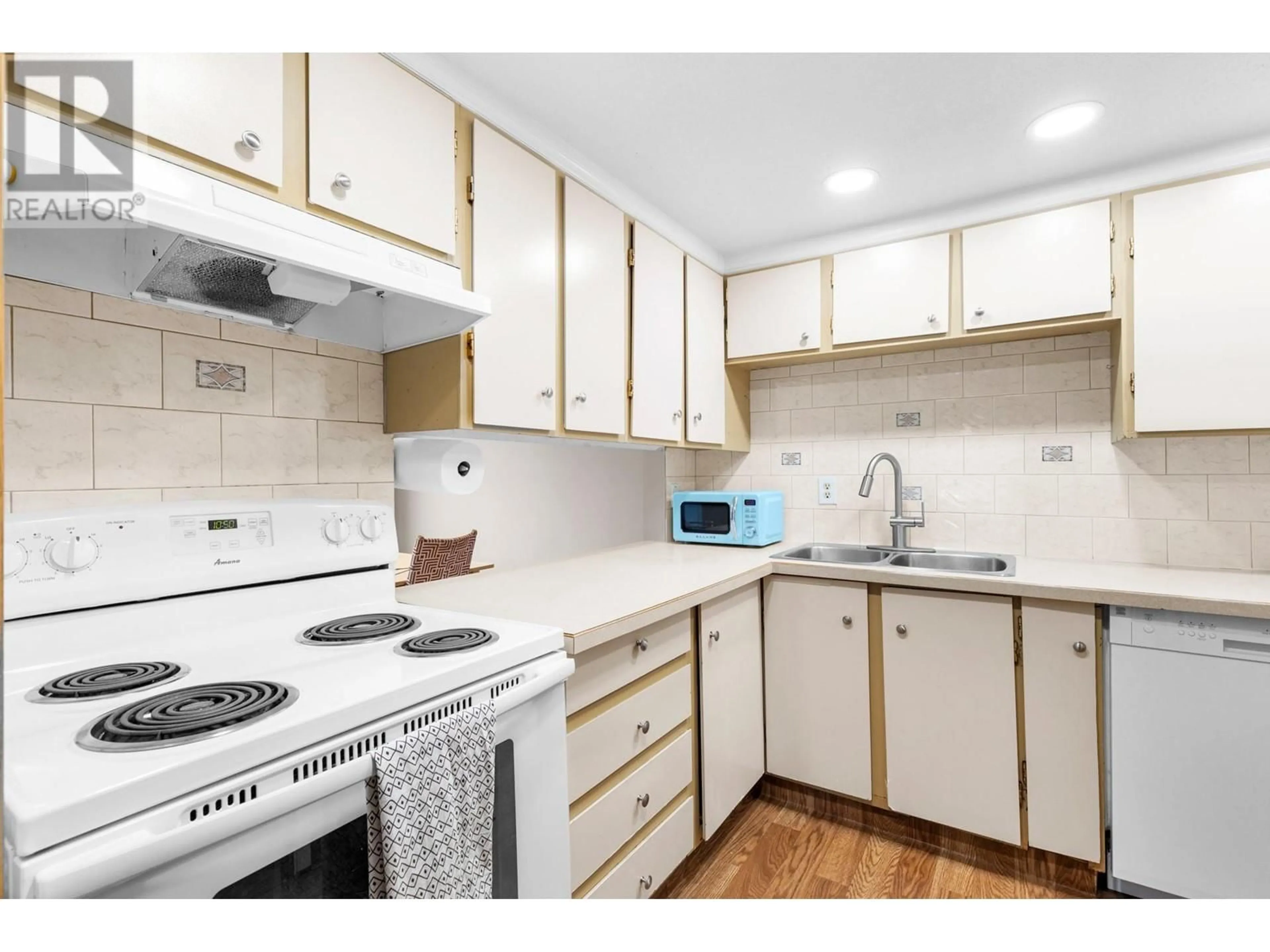 Standard kitchen, wood/laminate floor for 9 - 1471 INKAR ROAD, Kelowna British Columbia V1Y8J1
