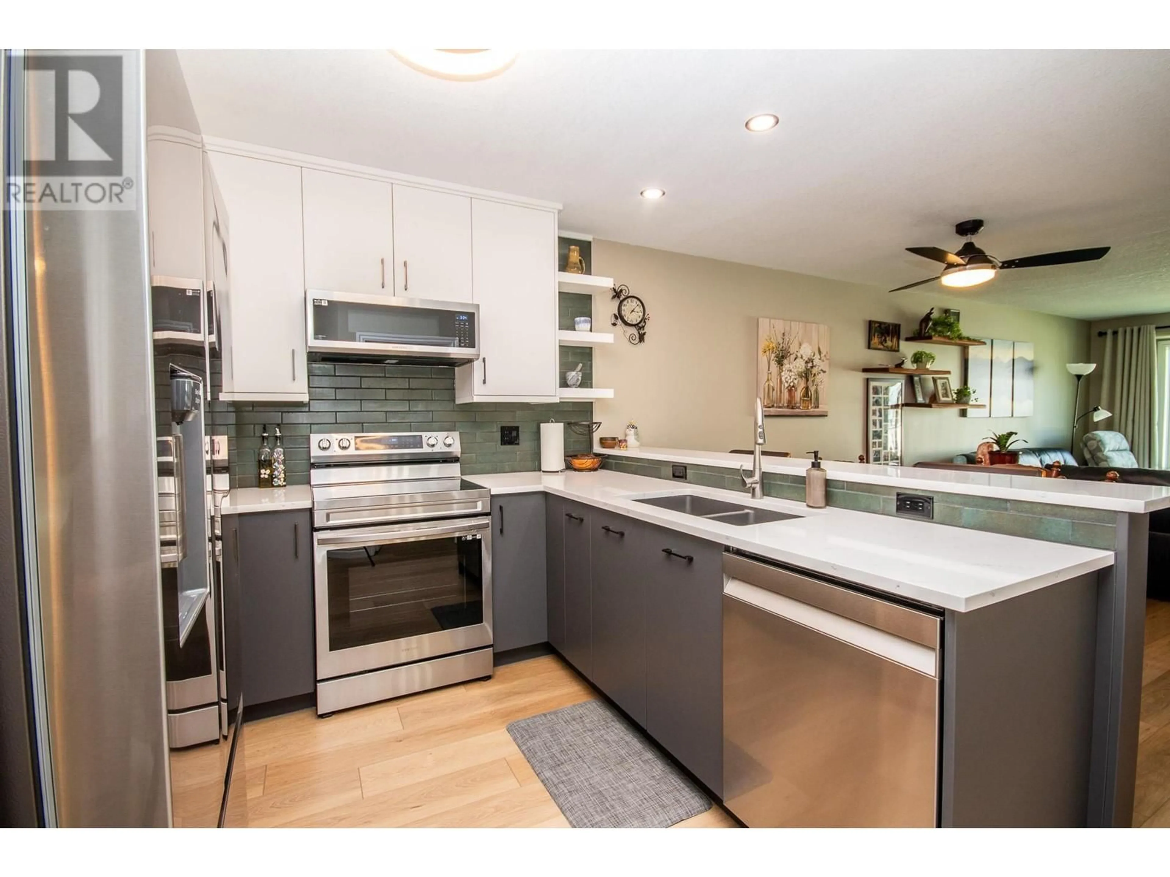 Open concept kitchen, ceramic/tile floor for 102 - 10805 13 STREET, Dawson Creek British Columbia V1G4E5
