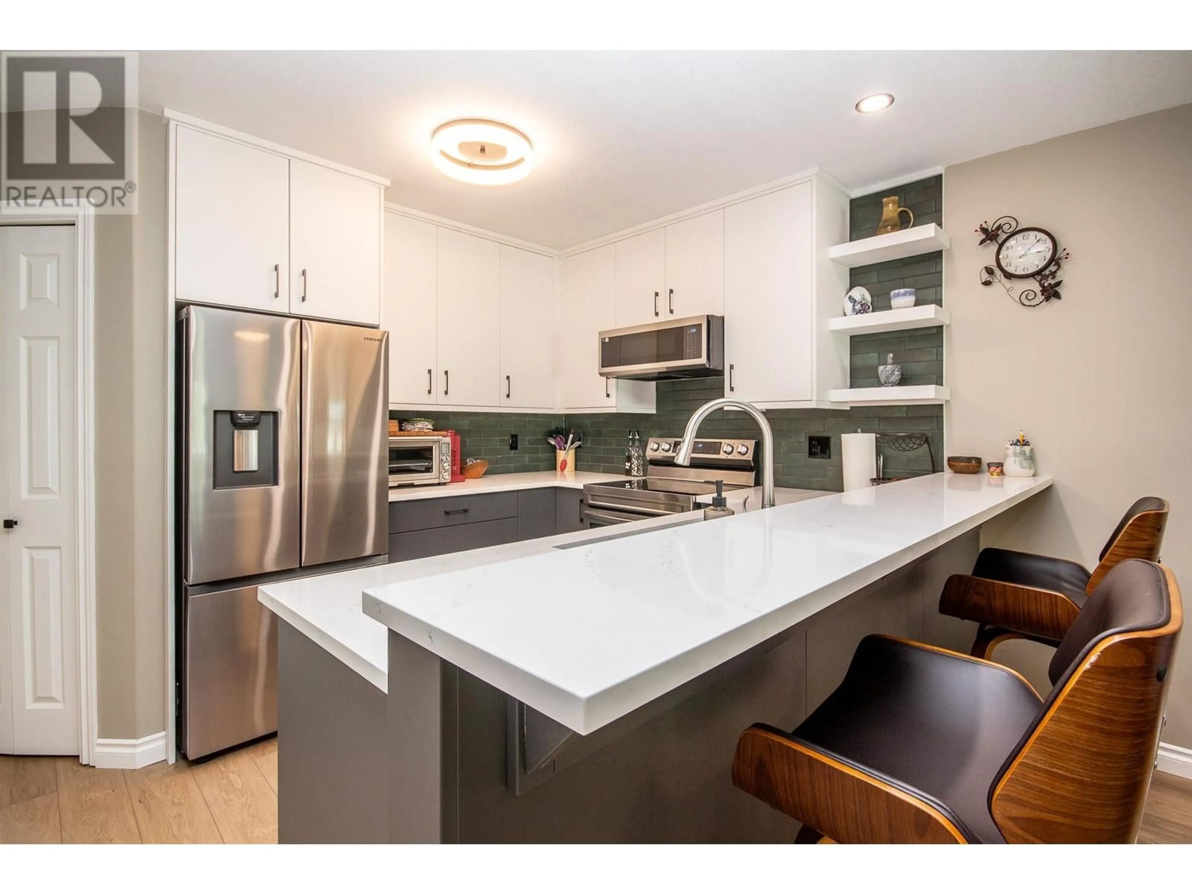 Open concept kitchen, unknown for 102 - 10805 13 STREET, Dawson Creek British Columbia V1G4E5