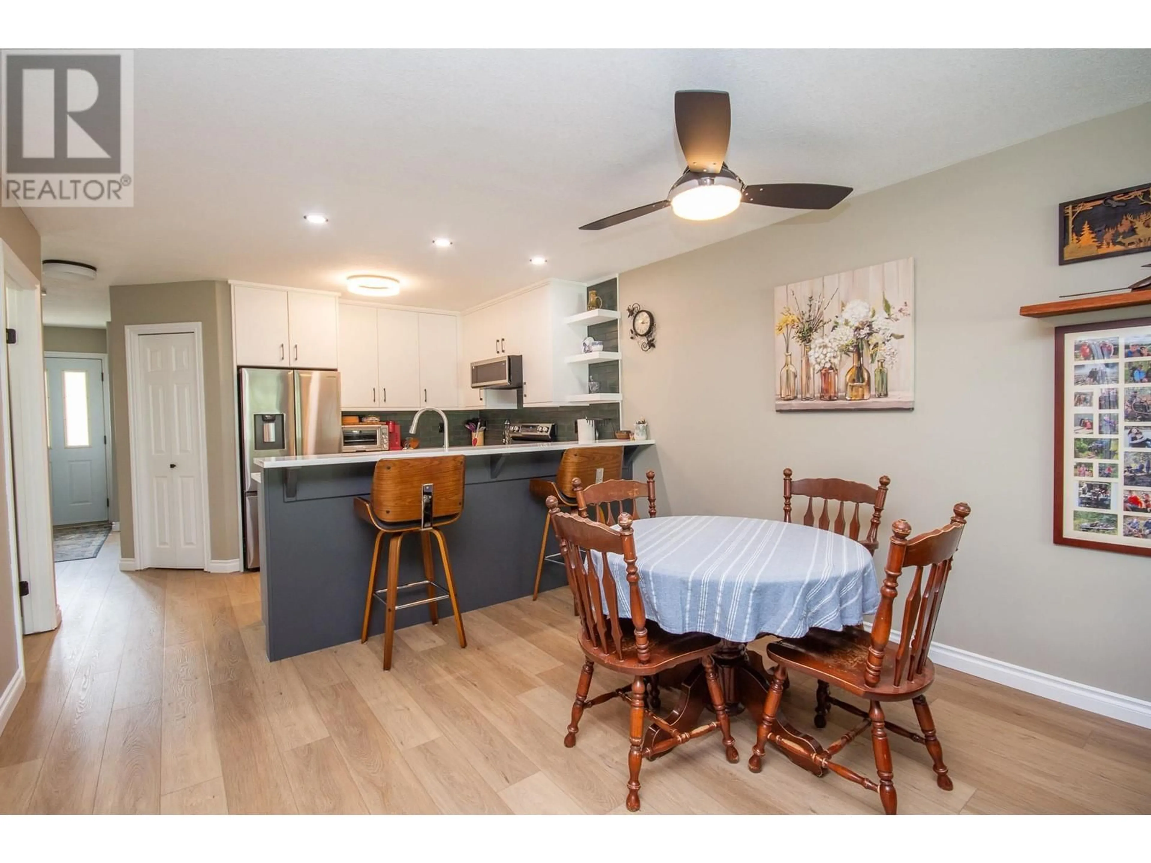 Open concept kitchen, wood/laminate floor for 102 - 10805 13 STREET, Dawson Creek British Columbia V1G4E5