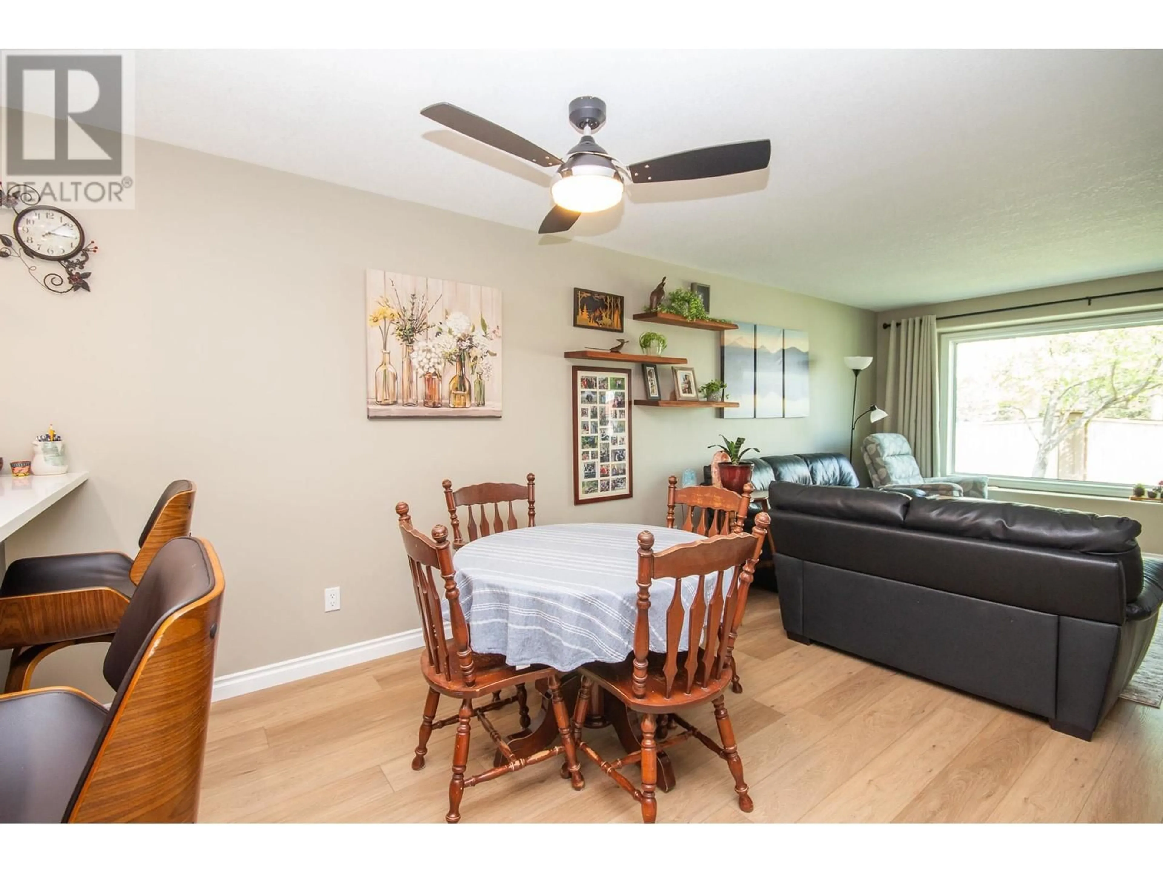Dining room, wood/laminate floor for 102 - 10805 13 STREET, Dawson Creek British Columbia V1G4E5