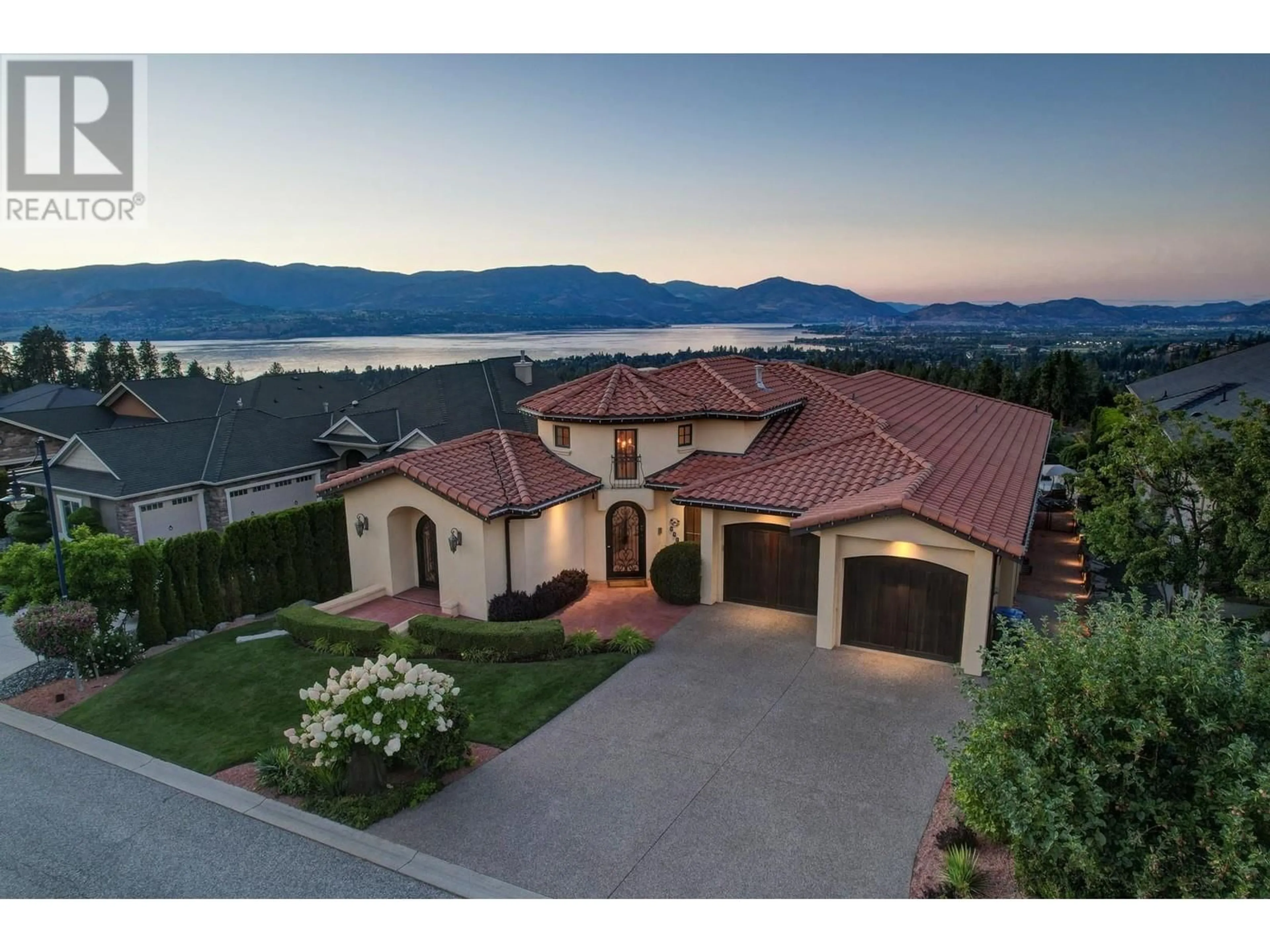 A pic from outside/outdoor area/front of a property/back of a property/a pic from drone, mountain view for 660 ALMANDINE COURT, Kelowna British Columbia V1W4Z5