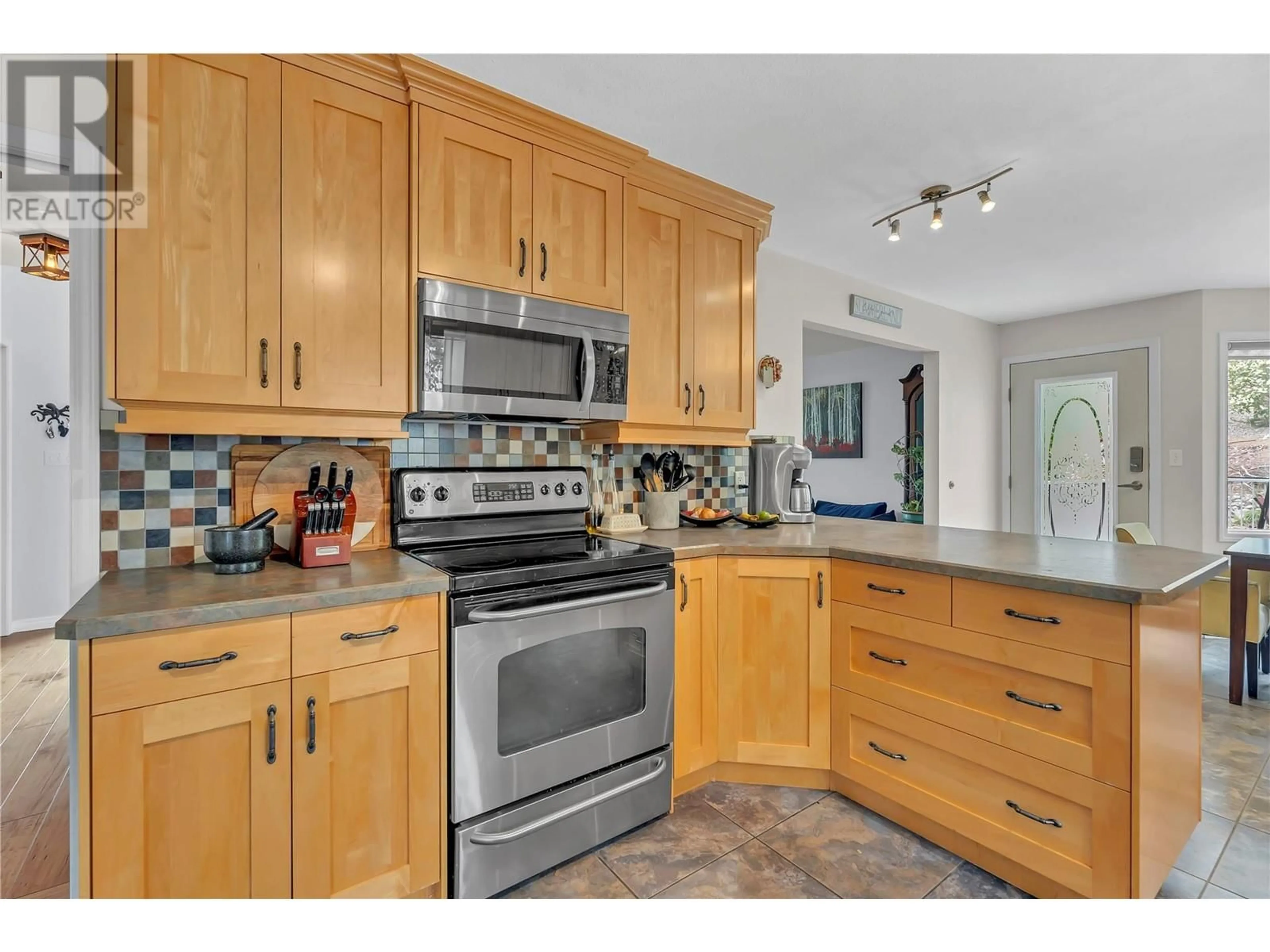 Open concept kitchen, unknown for 7982 VICTORIA ROAD SOUTH, Summerland British Columbia V0H1Z2