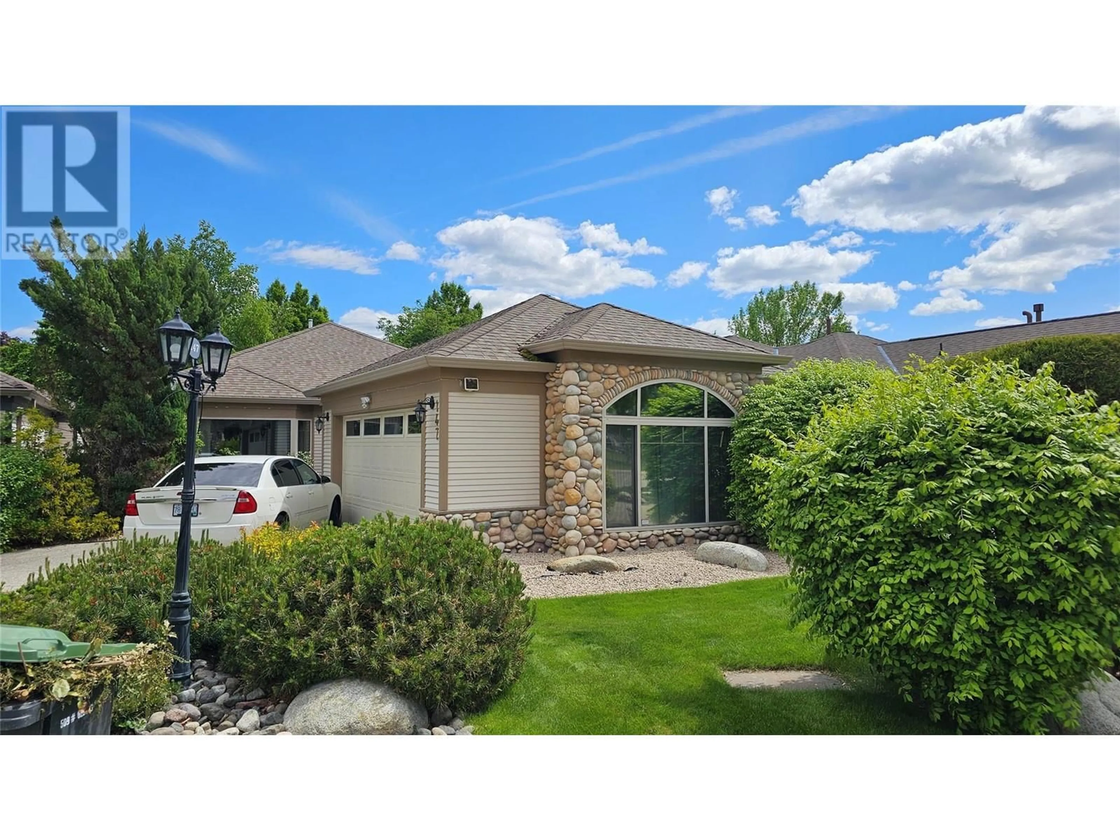 Home with vinyl exterior material, water/lake/river/ocean view for 147 - 4074 GELLATLY ROAD, West Kelowna British Columbia V4T2S8
