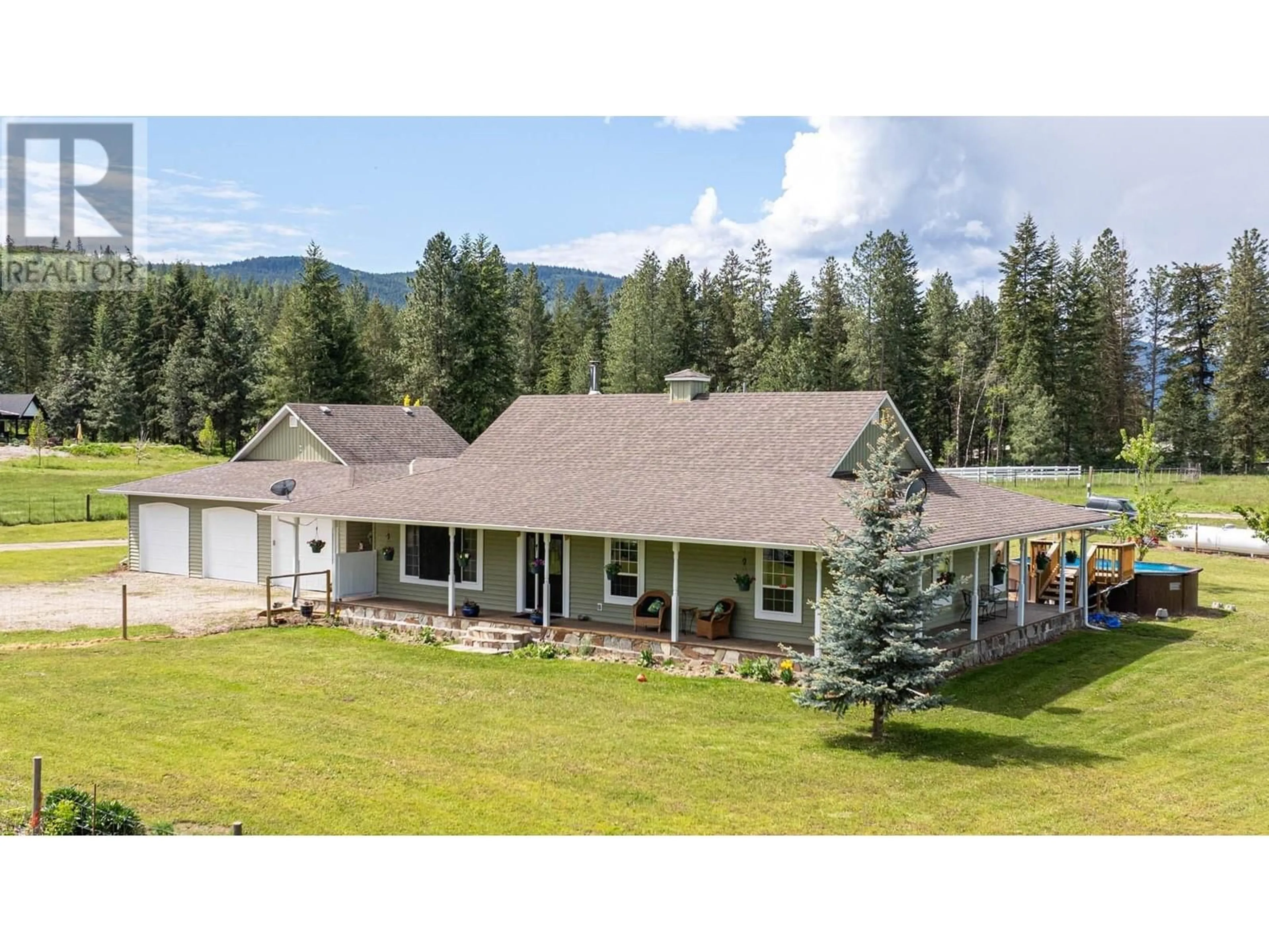 A pic from outside/outdoor area/front of a property/back of a property/a pic from drone, mountain view for 4858 SALMON RIVER ROAD, Spallumcheen British Columbia V0E1B4