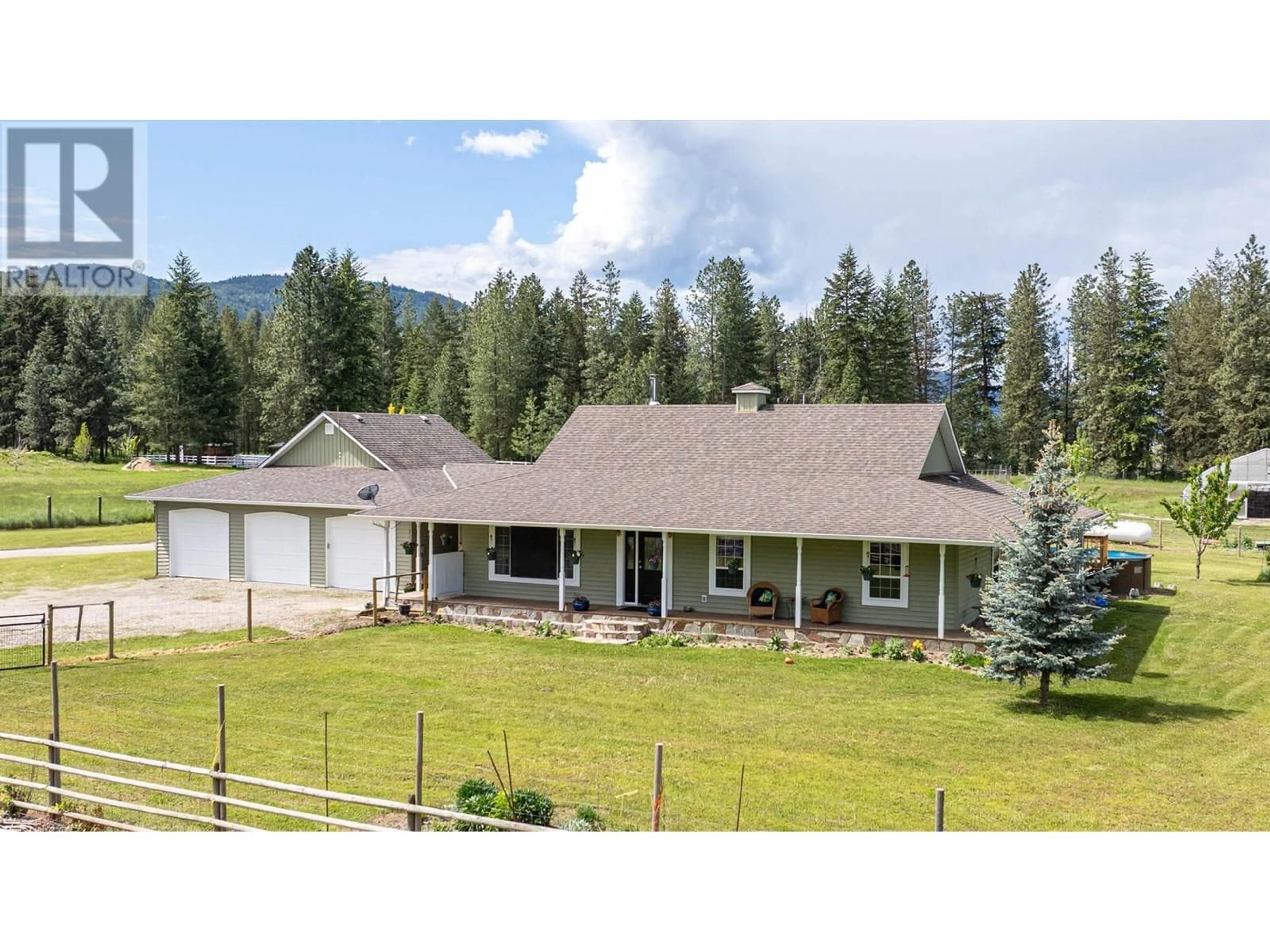 A pic from outside/outdoor area/front of a property/back of a property/a pic from drone, mountain view for 4858 SALMON RIVER ROAD, Spallumcheen British Columbia V0E1B4