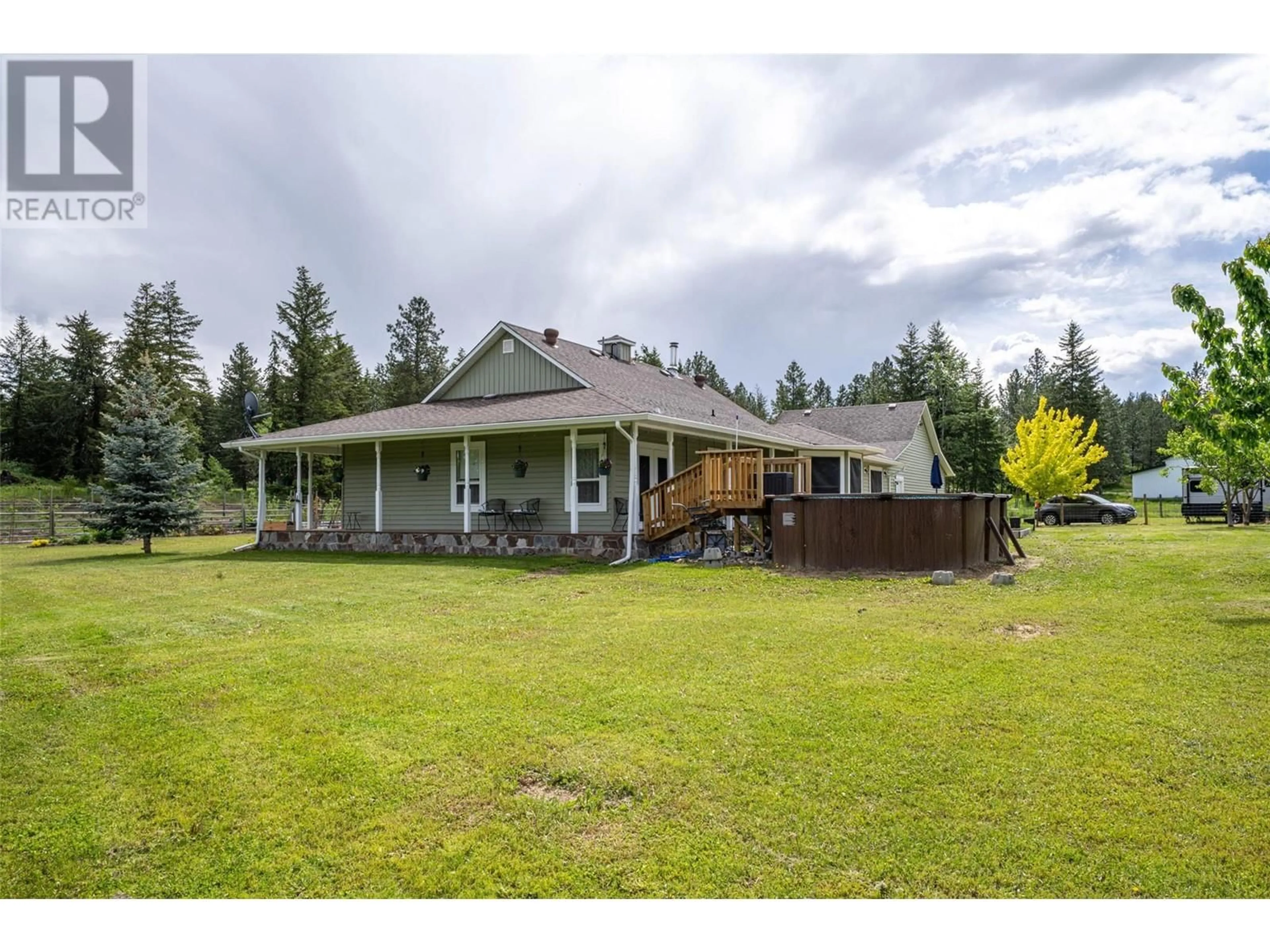 A pic from outside/outdoor area/front of a property/back of a property/a pic from drone, unknown for 4858 SALMON RIVER ROAD, Spallumcheen British Columbia V0E1B4