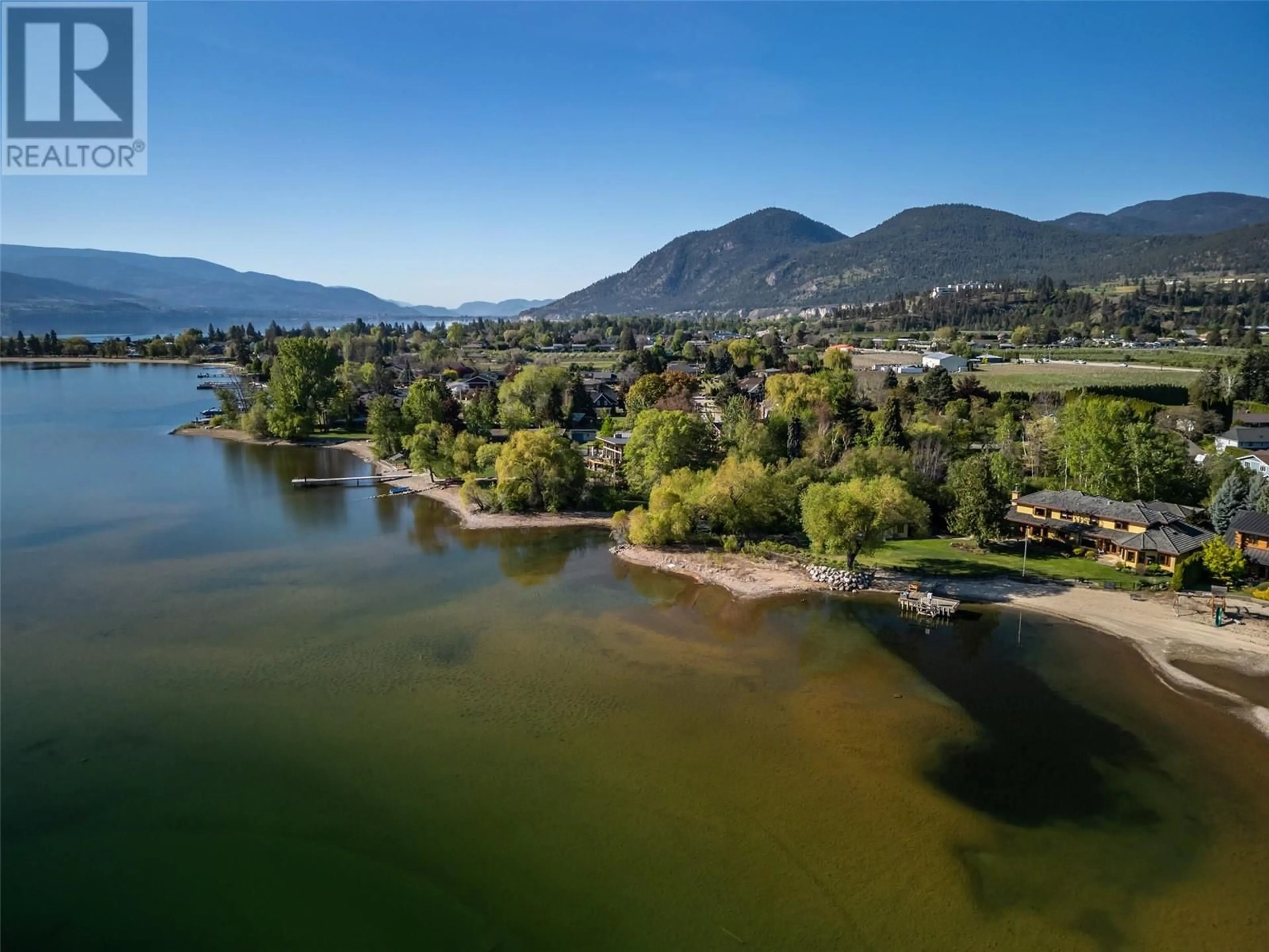 A pic from outside/outdoor area/front of a property/back of a property/a pic from drone, water/lake/river/ocean view for 7801 OAK AVENUE, Summerland British Columbia V0H1Z9