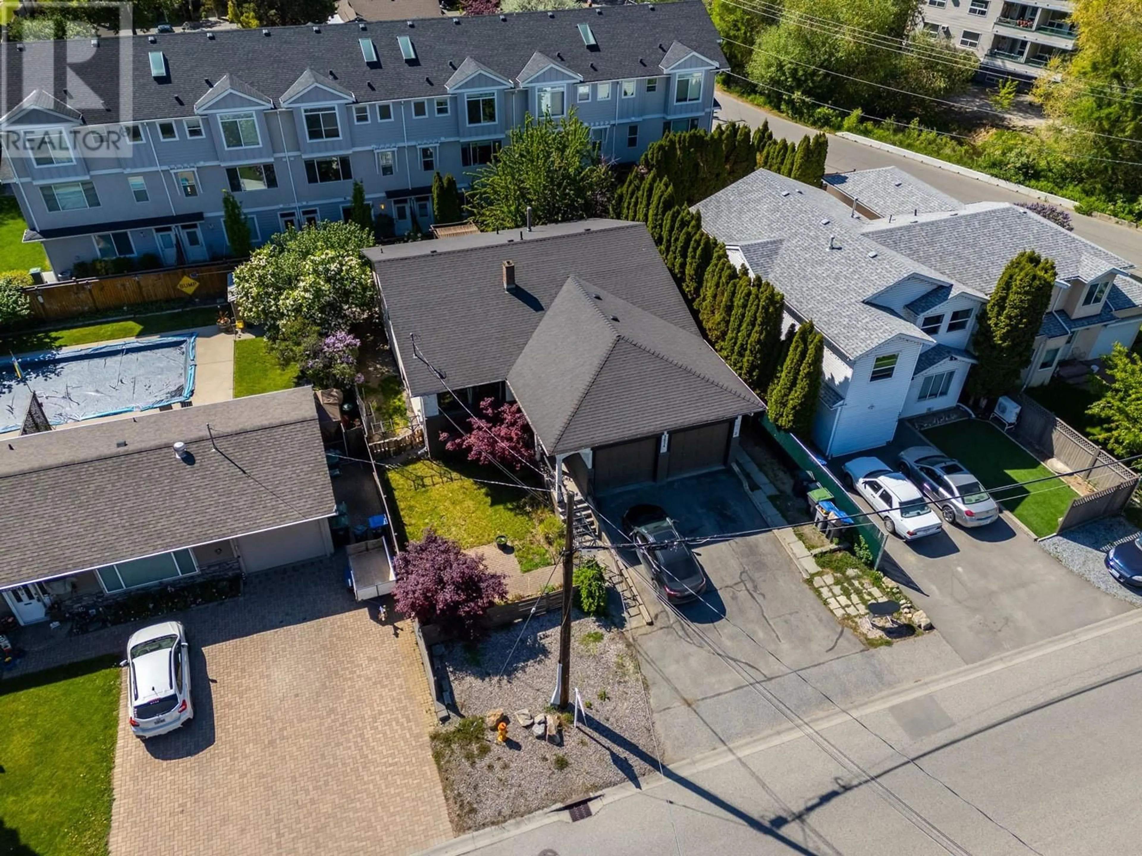 A pic from outside/outdoor area/front of a property/back of a property/a pic from drone, street for 2024 WILKINSON STREET, Kelowna British Columbia V1Y3Z8