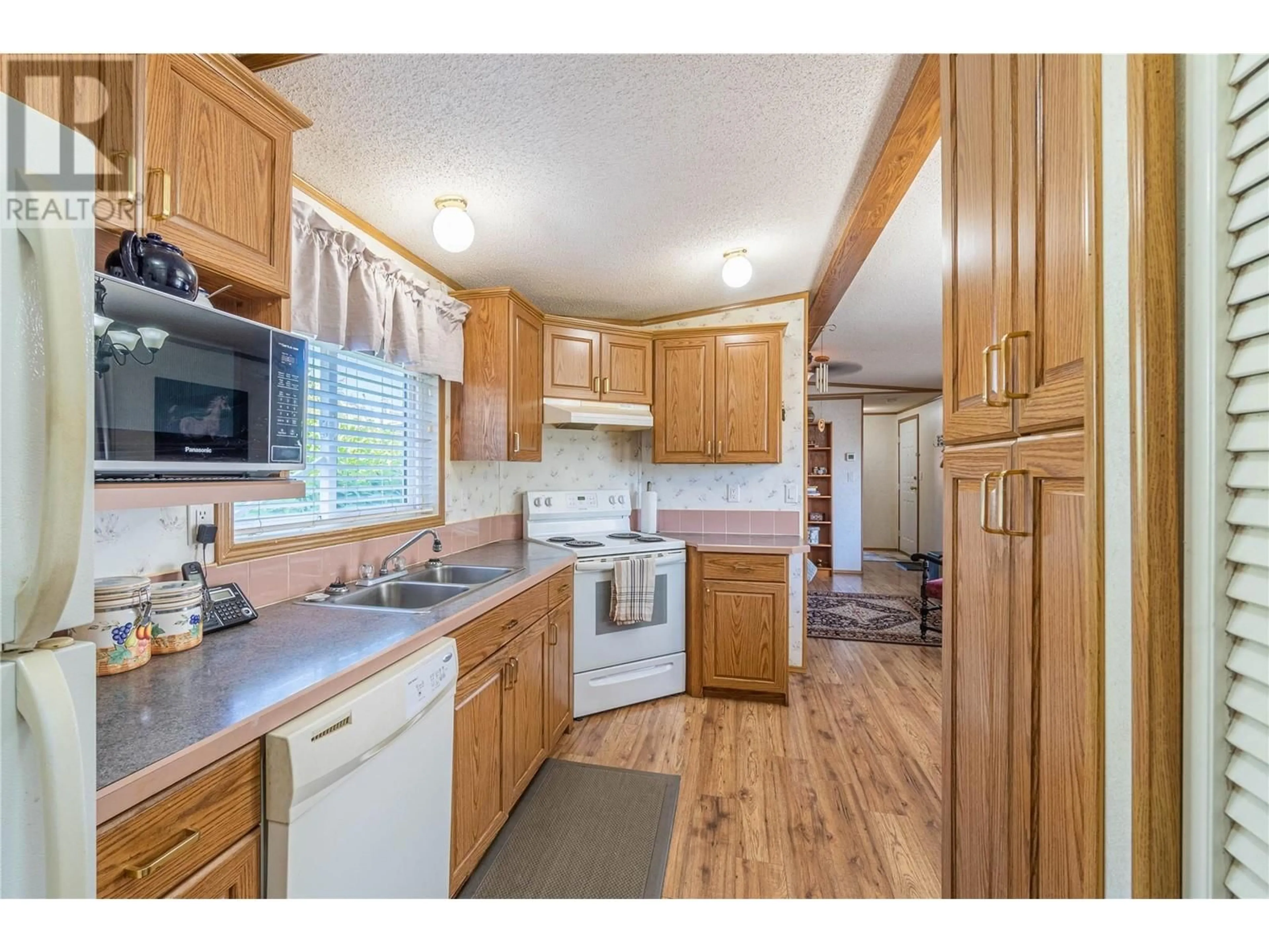Standard kitchen, wood/laminate floor for B17 - 7155 DALLAS DRIVE, Kamloops British Columbia V3S6X6