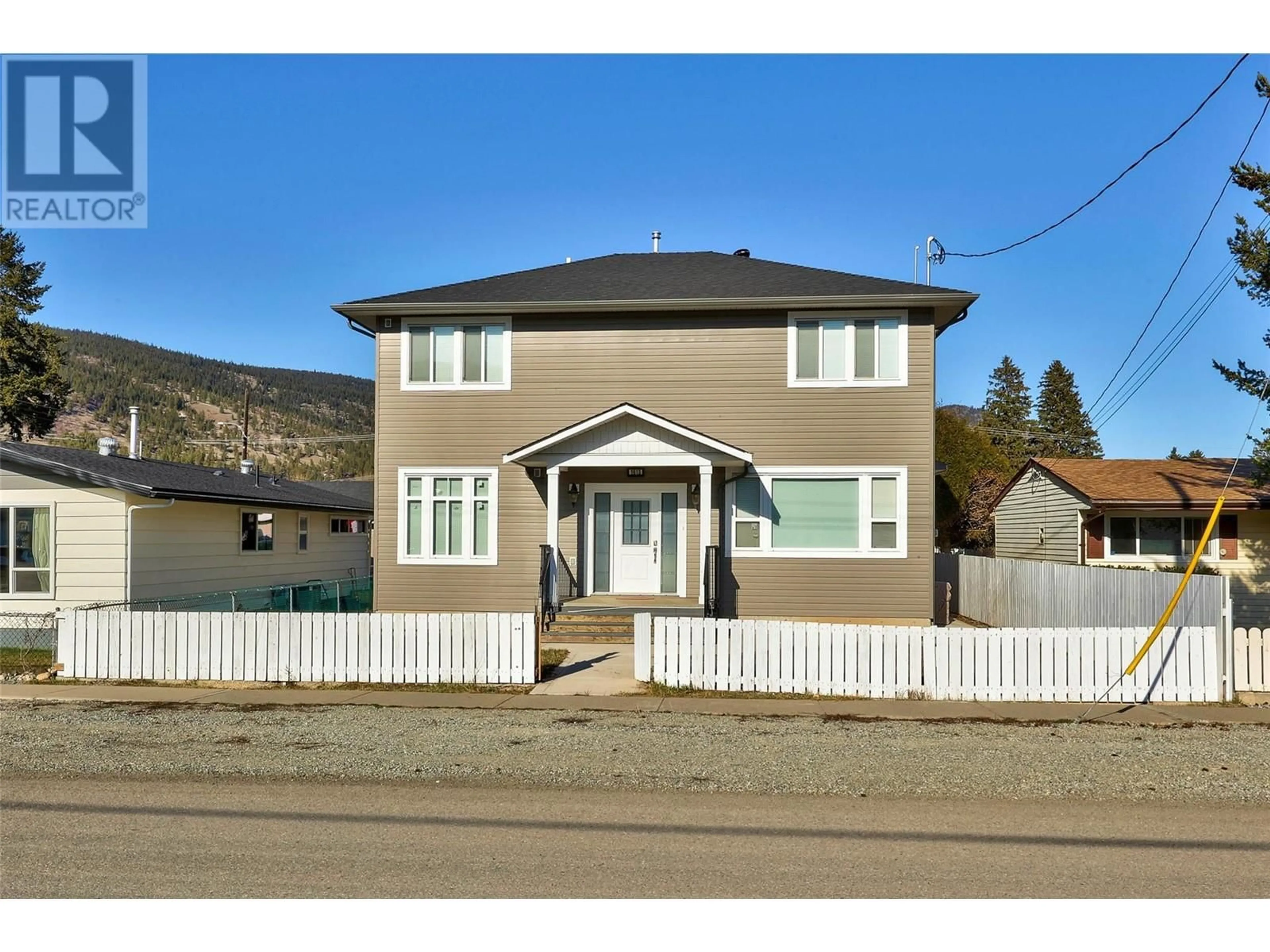 Home with vinyl exterior material, street for 1613 CANFORD AVENUE, Merritt British Columbia V1K1R6