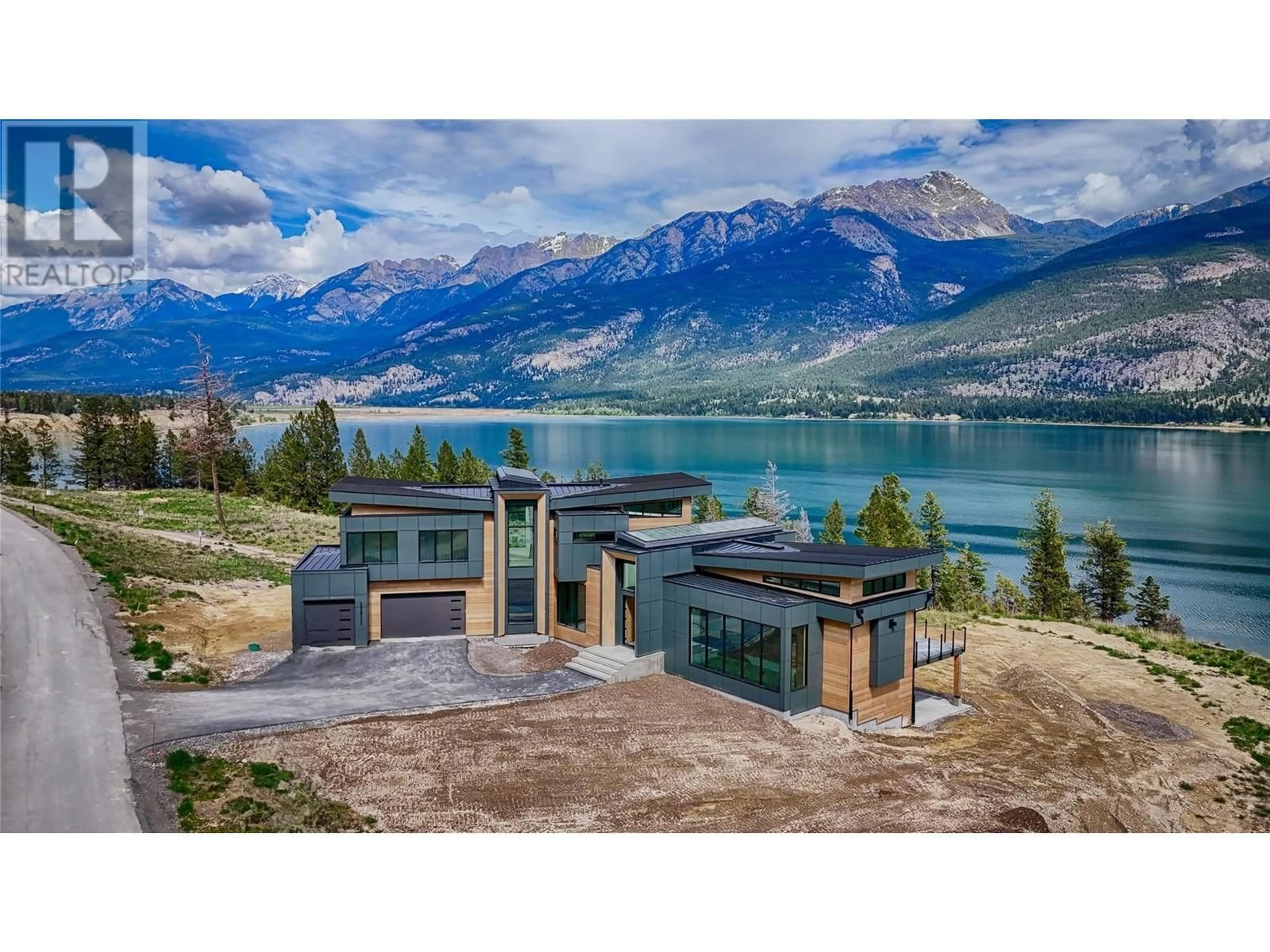 A pic from outside/outdoor area/front of a property/back of a property/a pic from drone, water/lake/river/ocean view for 4 - 6200 COLUMBIA LAKE ROAD, Columbia Lake British Columbia V0B1L2