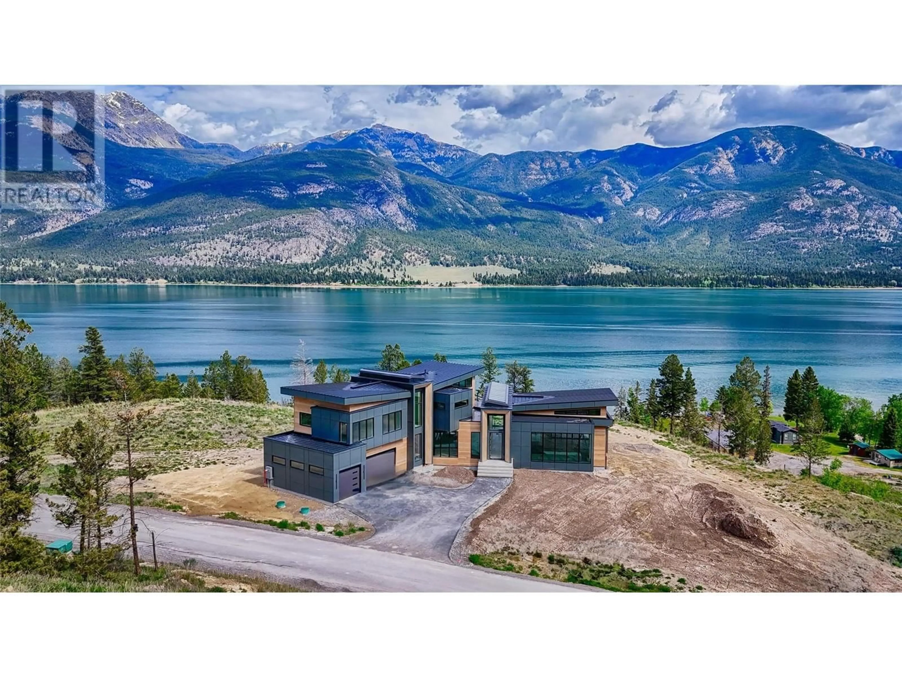 A pic from outside/outdoor area/front of a property/back of a property/a pic from drone, water/lake/river/ocean view for 4 - 6200 COLUMBIA LAKE ROAD, Columbia Lake British Columbia V0B1L2